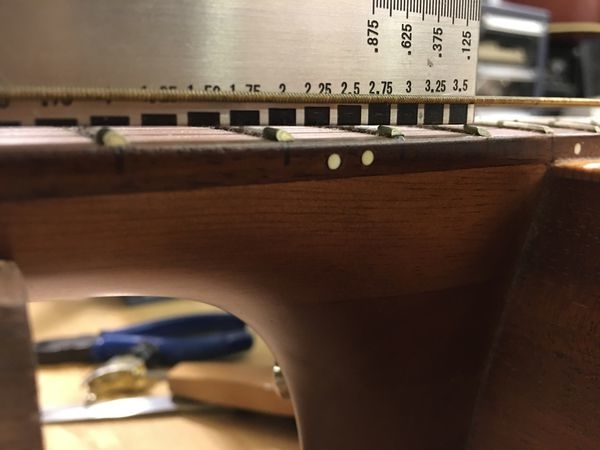 吉他弦枕過高調整