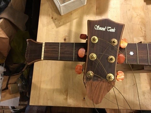 木吉他琴頭斷裂修復