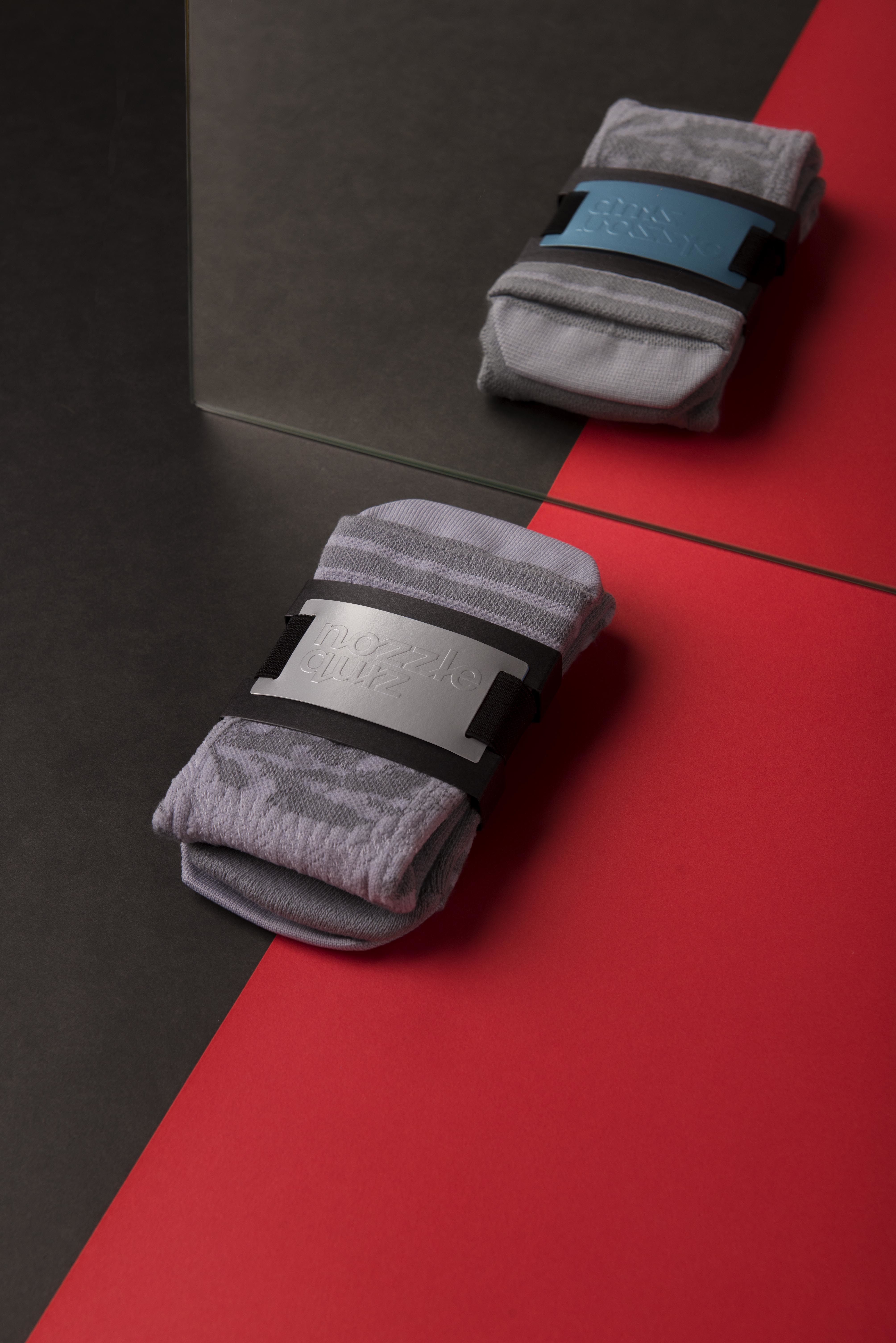 台灣街頭襪子品牌 nozzle quiz，以機能襪履為出發，利用拼貼手法與色彩衝撞，以"靜物畫"為概念，創作出寧靜中帶出街頭動能的LOOK