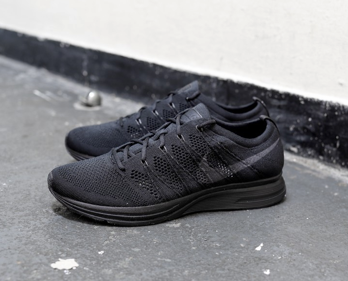 flyknit trainer triple black