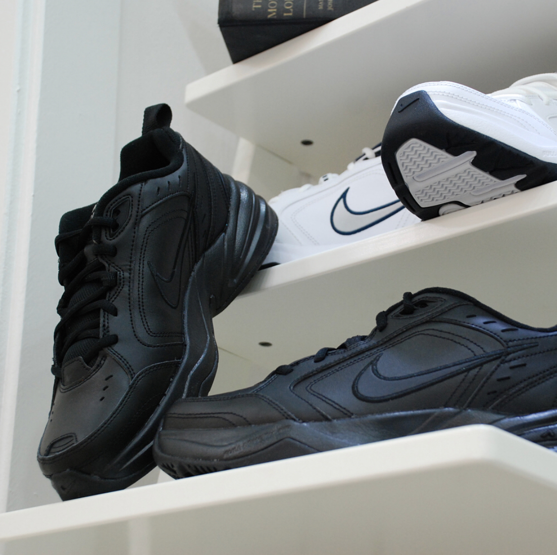 nike air monarch iv triple black