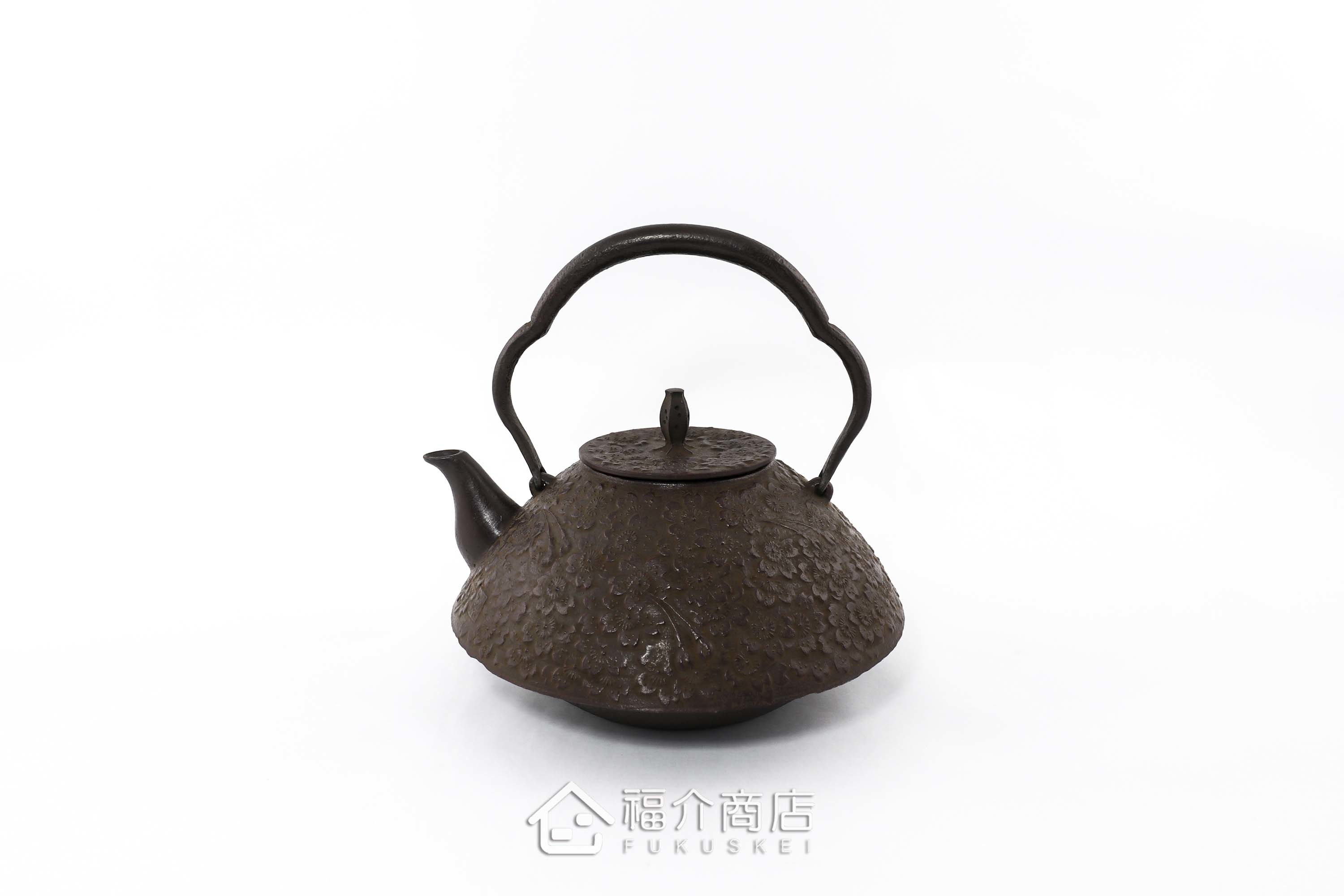房屋壺型與櫻花造型的日本鐵壺