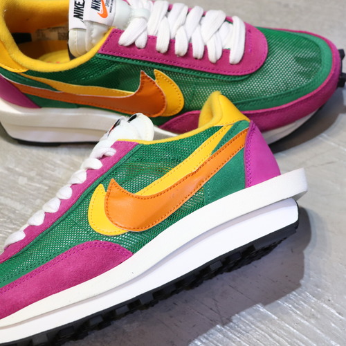 pink and green nike sacai
