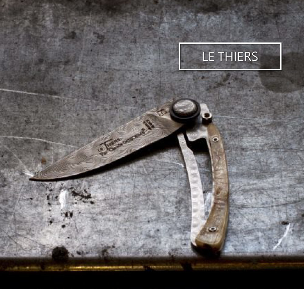 Master art pieces of folding knives le Thiers by master cutler Dozorme: damascus blade, chiseled spring, mammoth molar...