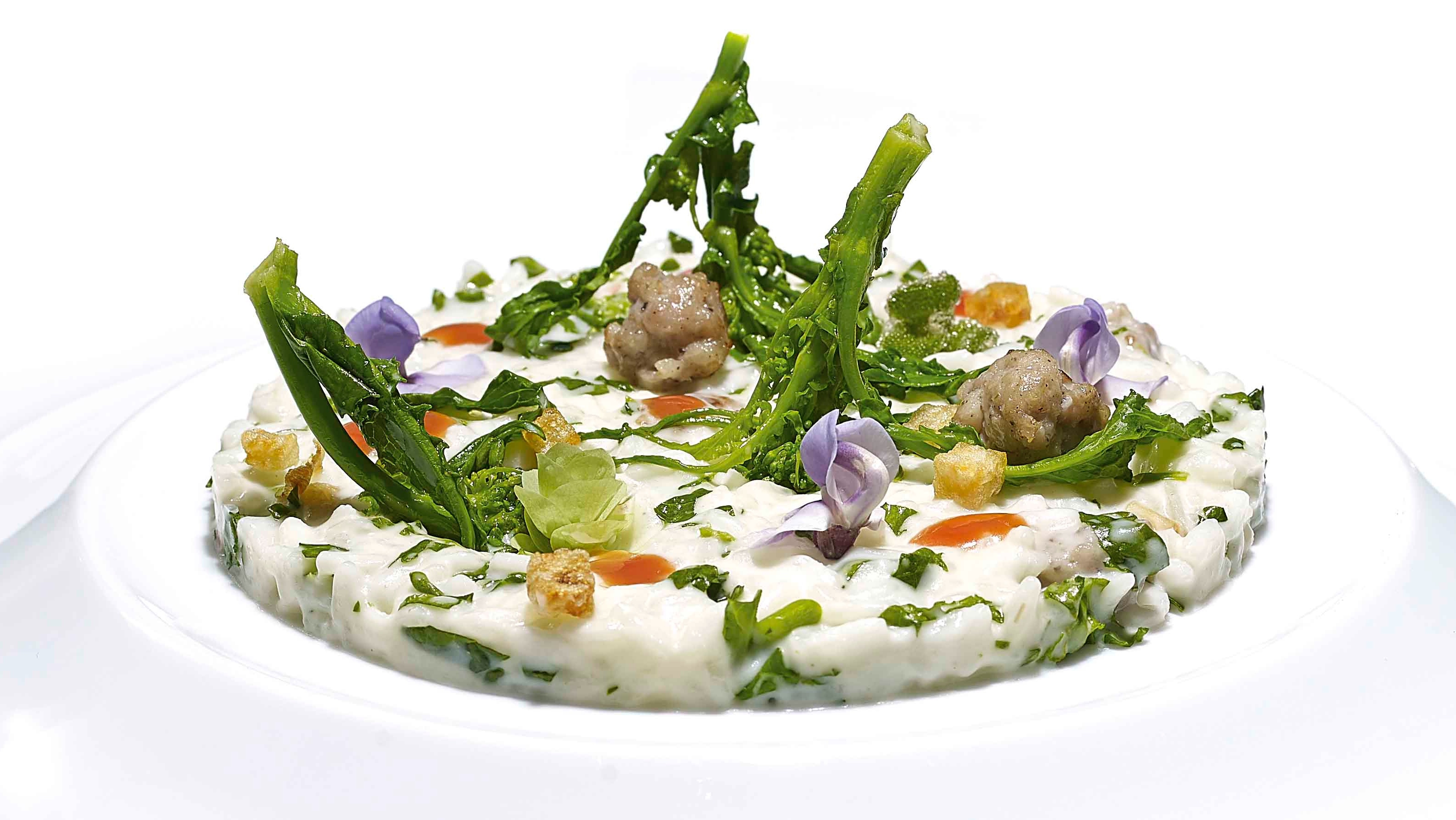 RISO AL LATTE OF MOZZARELLA, VEAL SAUSAGES AND CIME DI RAPA