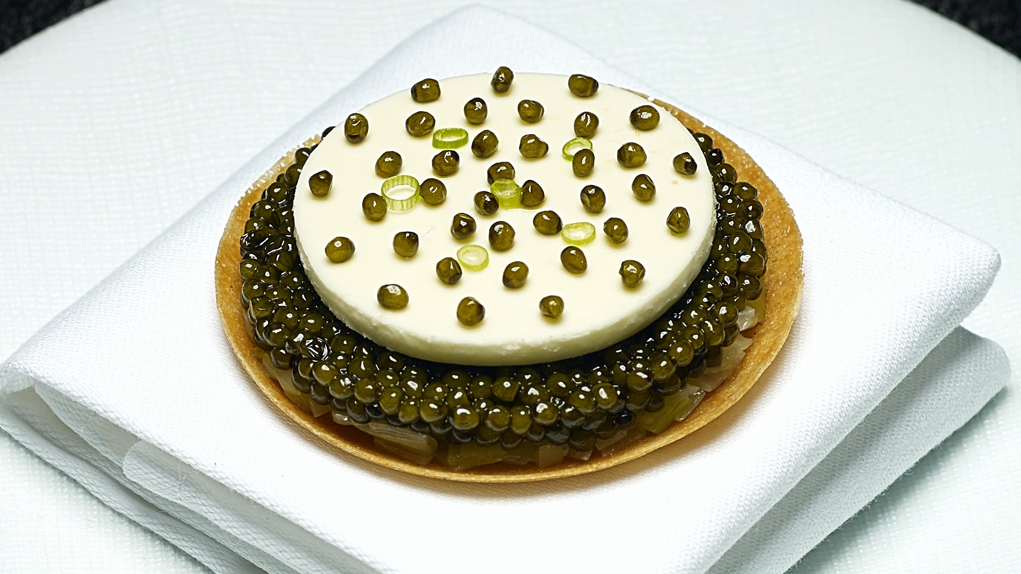Oscietra Gold Caviar, Winter Leek, Crème Fraiche, Feuille de Brick