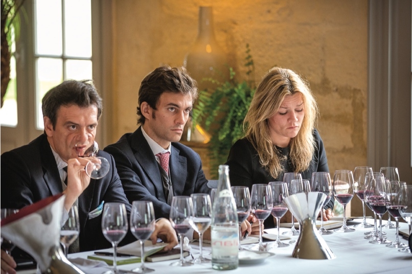 Perluigi Gorgoni (left), the author of this article, as he tastes the vintages of Cheval des Andes