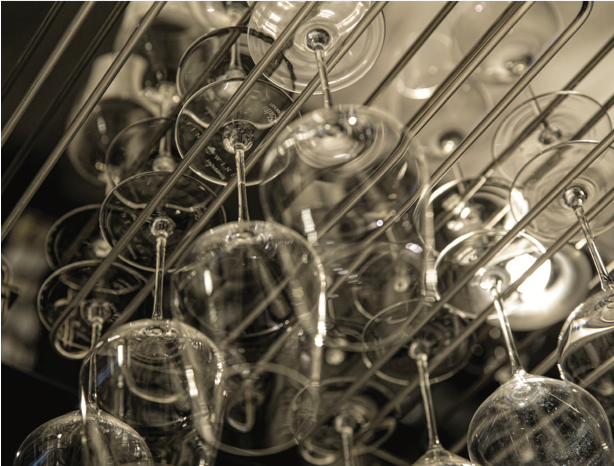 hanging from the wine rack are the elegant Zalto glasses from The Fine Wine Experience