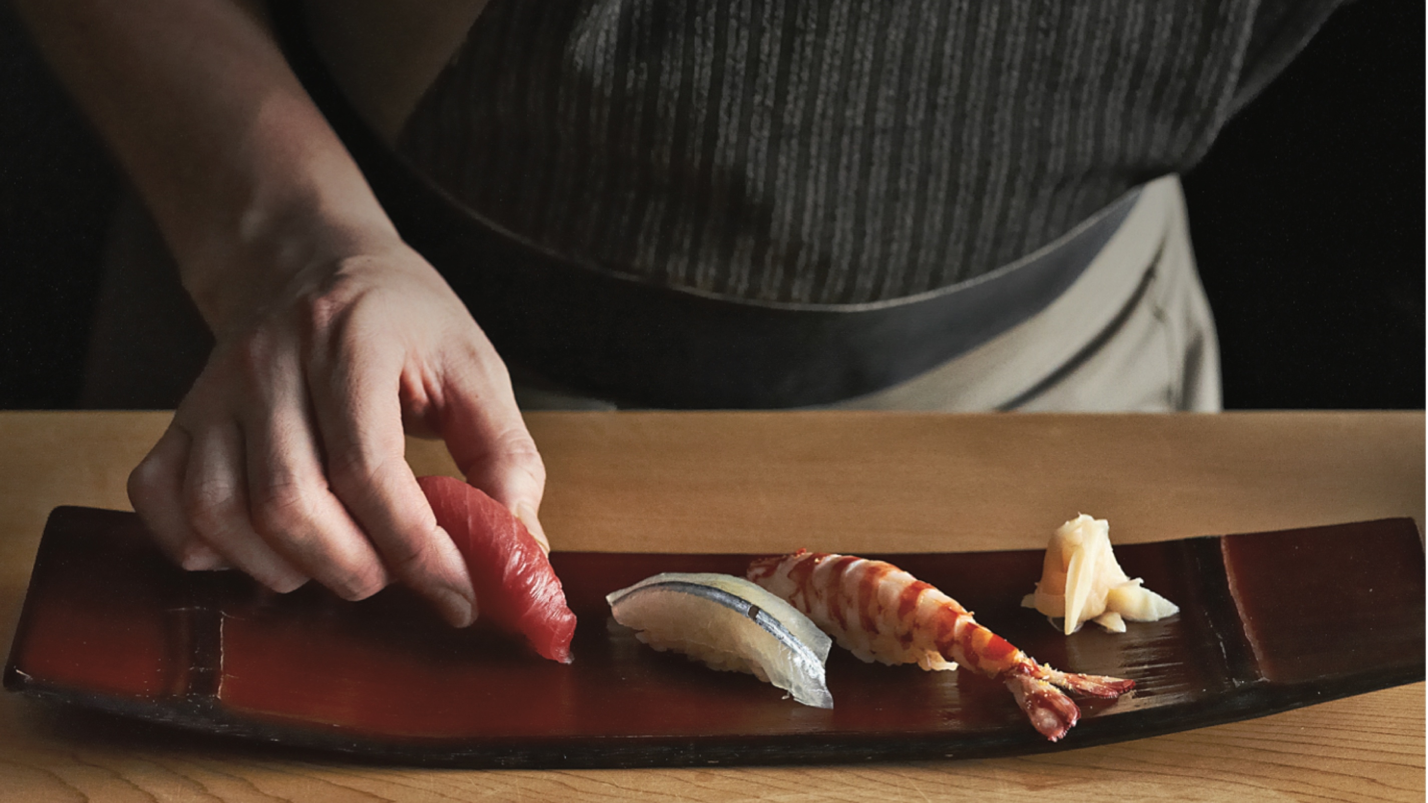 Chef of Sushi SORA Yuji Imaizumi delicately prepared nigiri sushi for diners