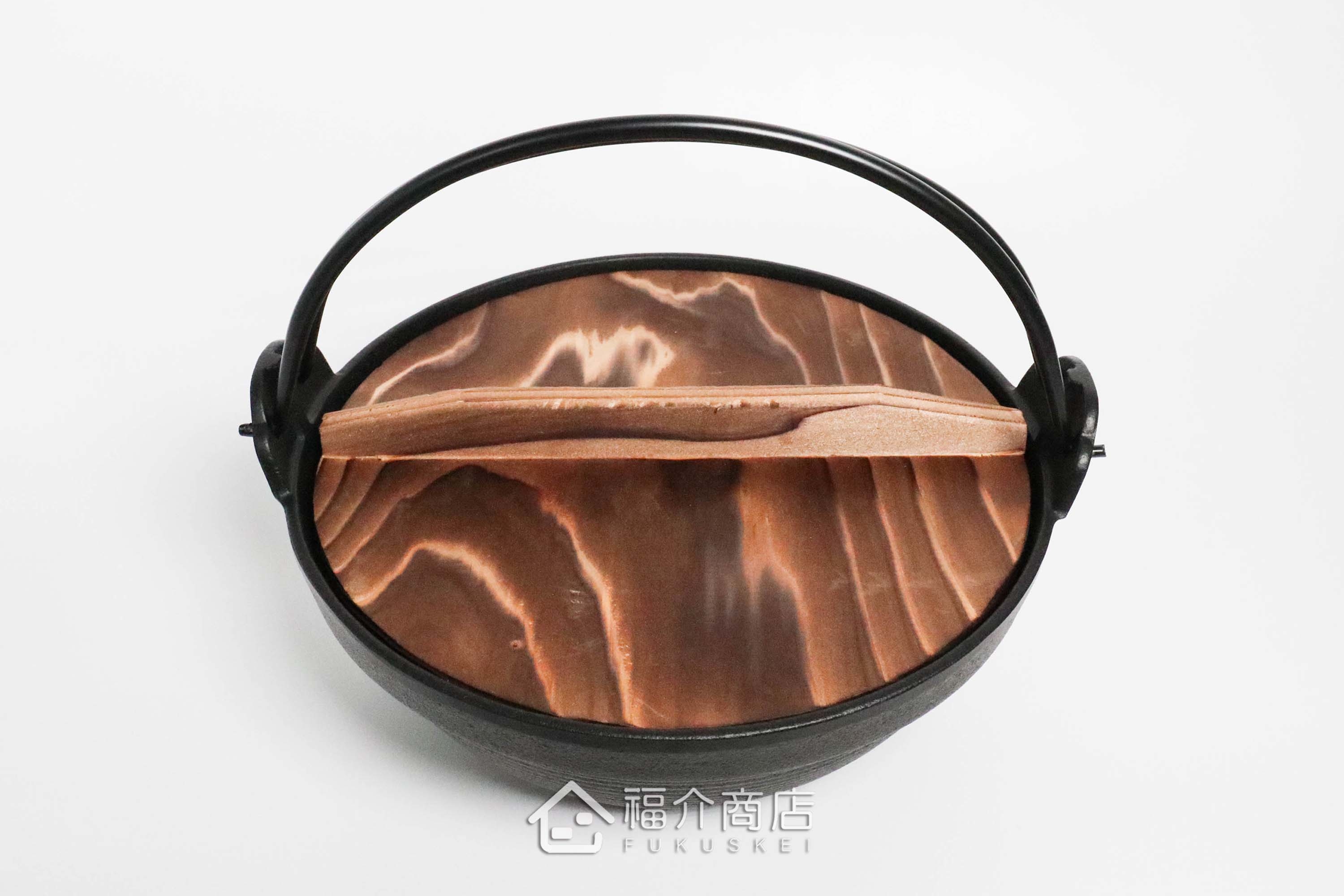 煮東西用的黑色鑄鐵鍋