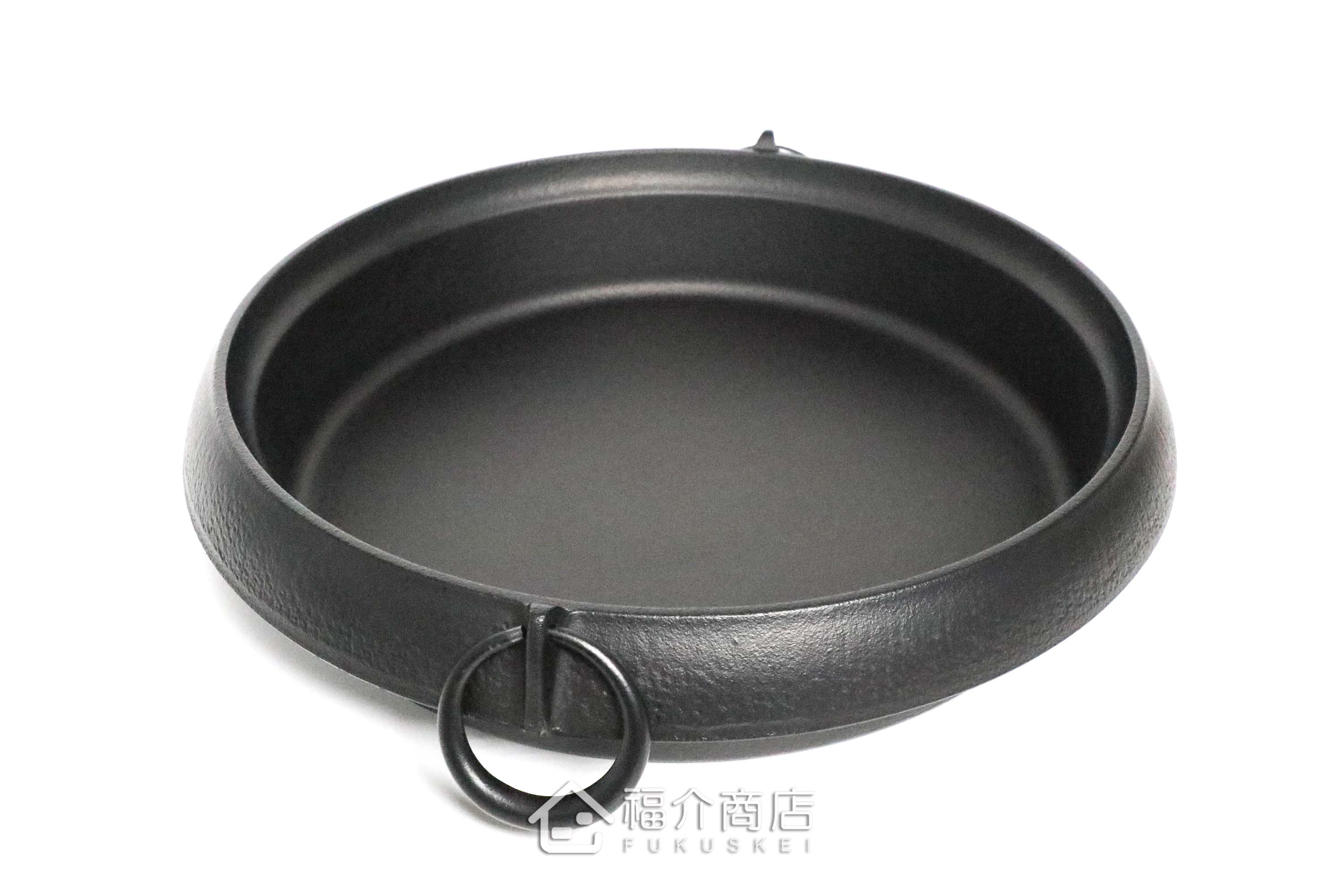 煮壽喜燒的黑色鑄鐵鍋
