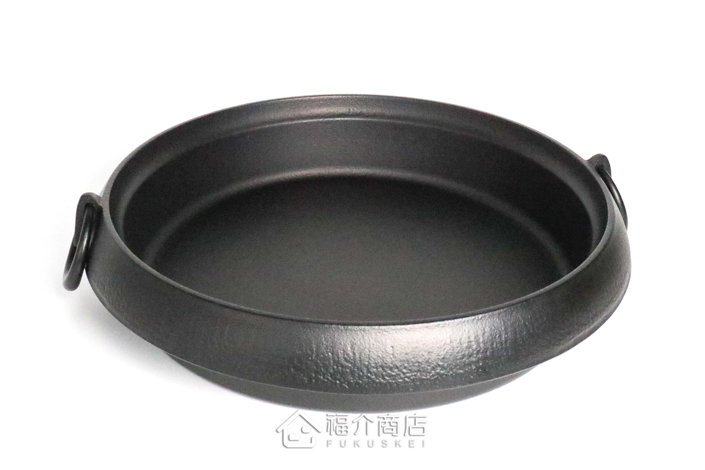 煮壽喜燒的黑色鑄鐵鍋