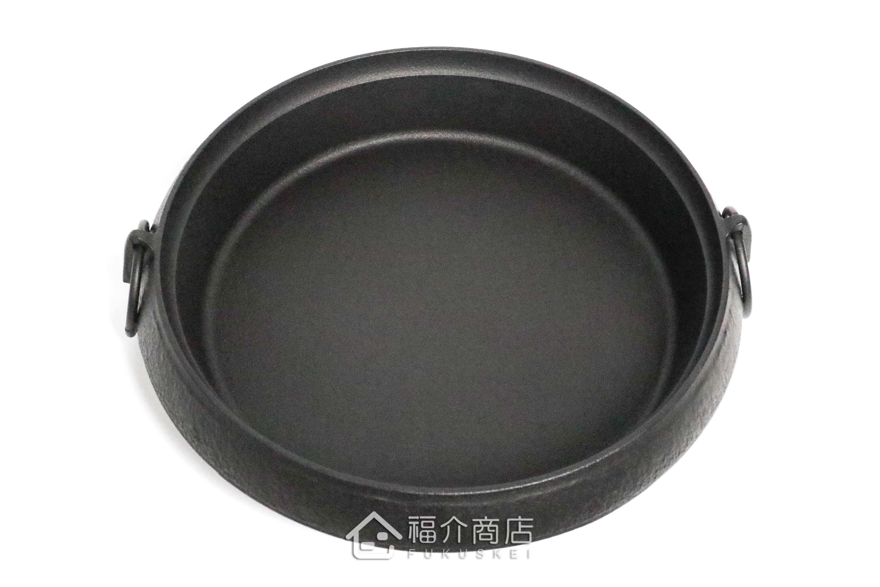 煮壽喜燒的黑色鑄鐵鍋