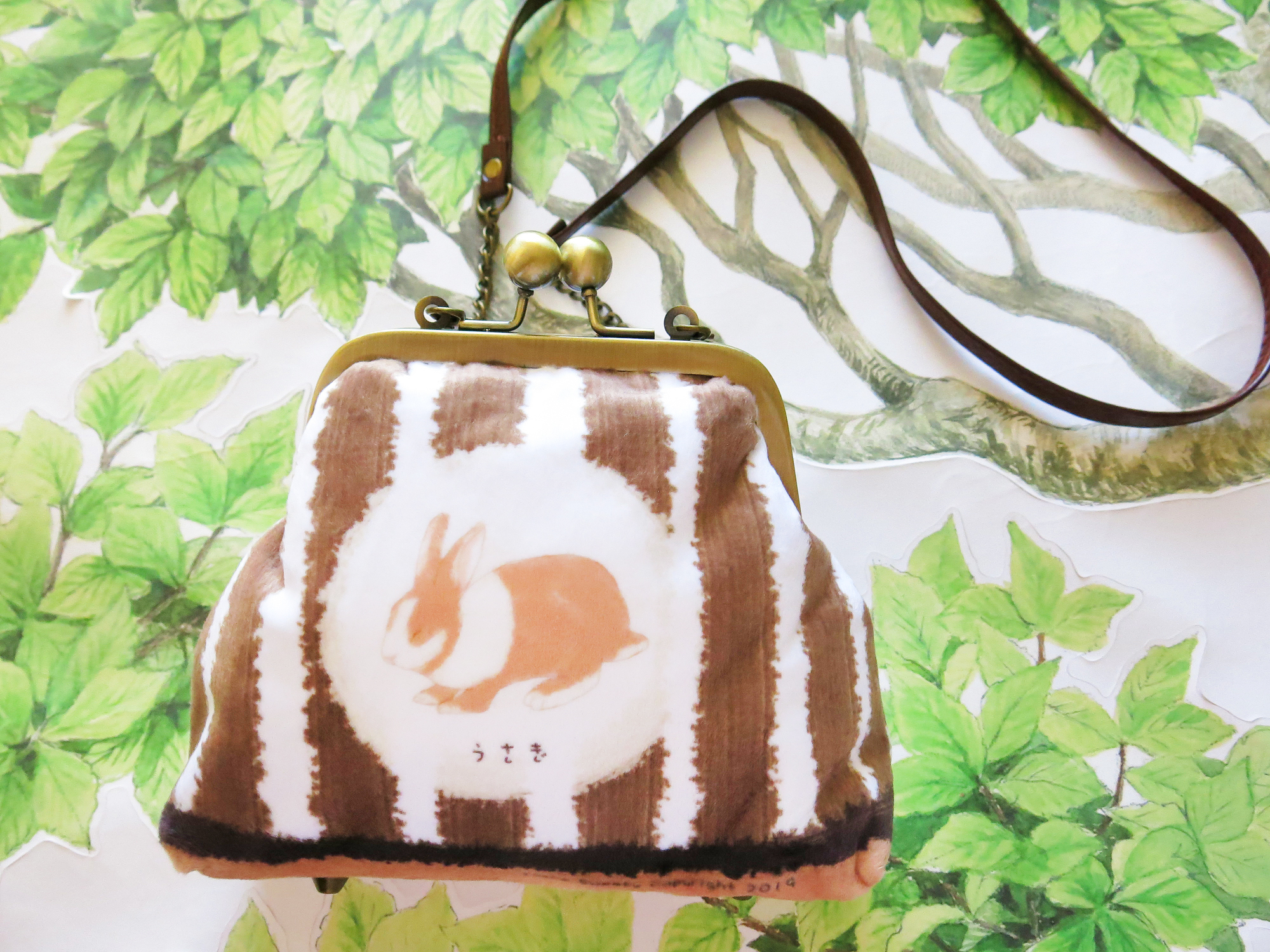 咖啡棕奶茶兔口金包