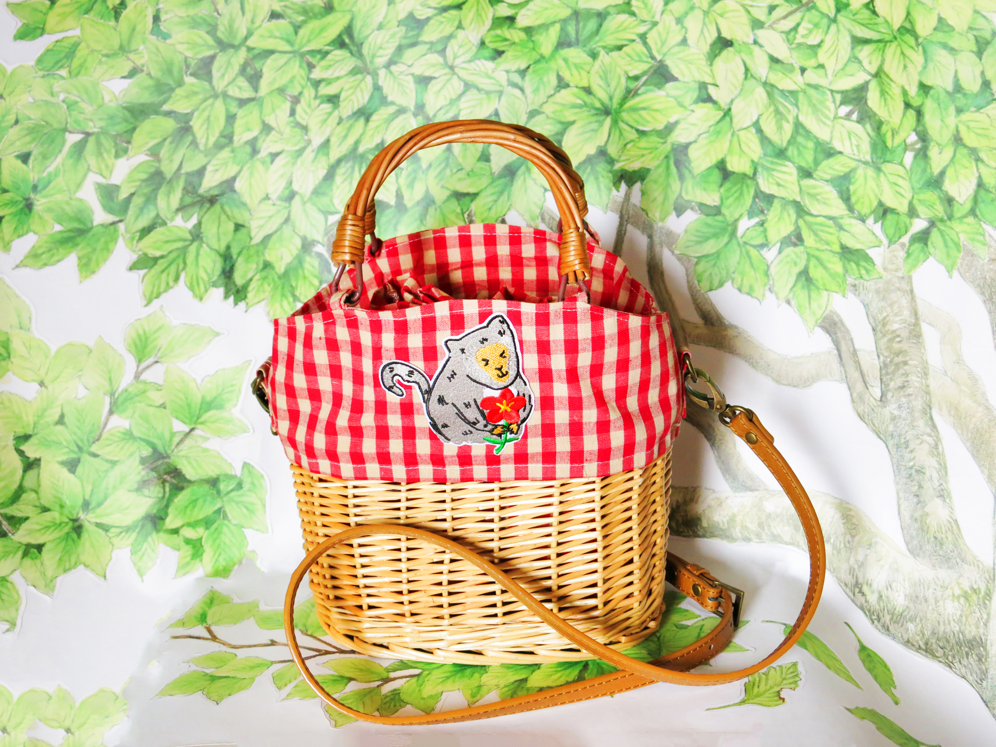 暖心小花猴帆布藤編包