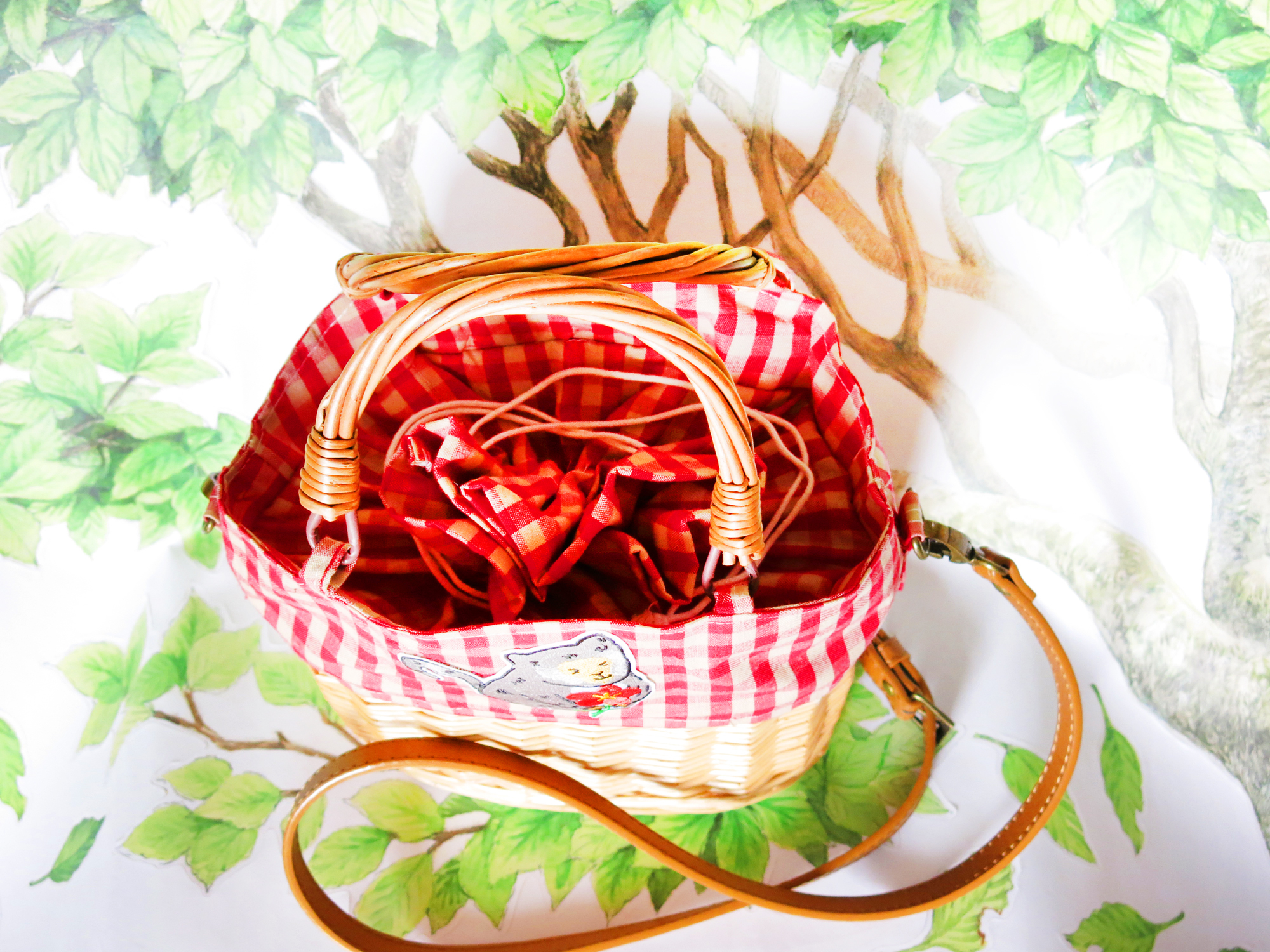 暖心小花猴帆布藤編包