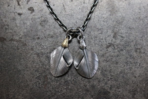 FCT-67心羽配鷹頭羽毛吊墜