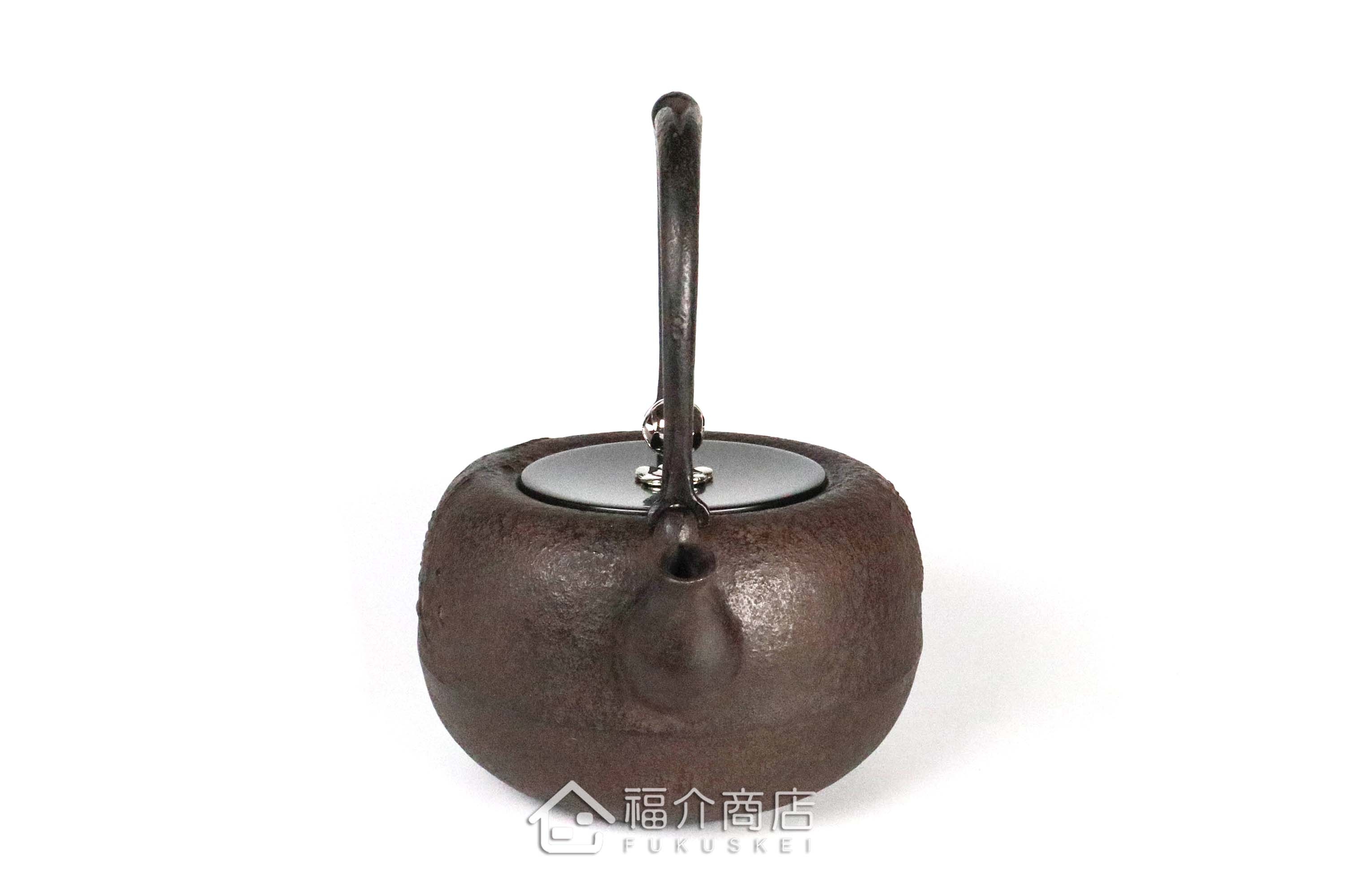 岩戶賢一郎所製作的日本鐵壺,壺身設計龍的圖紋,煮水泡茶用的鐵壺