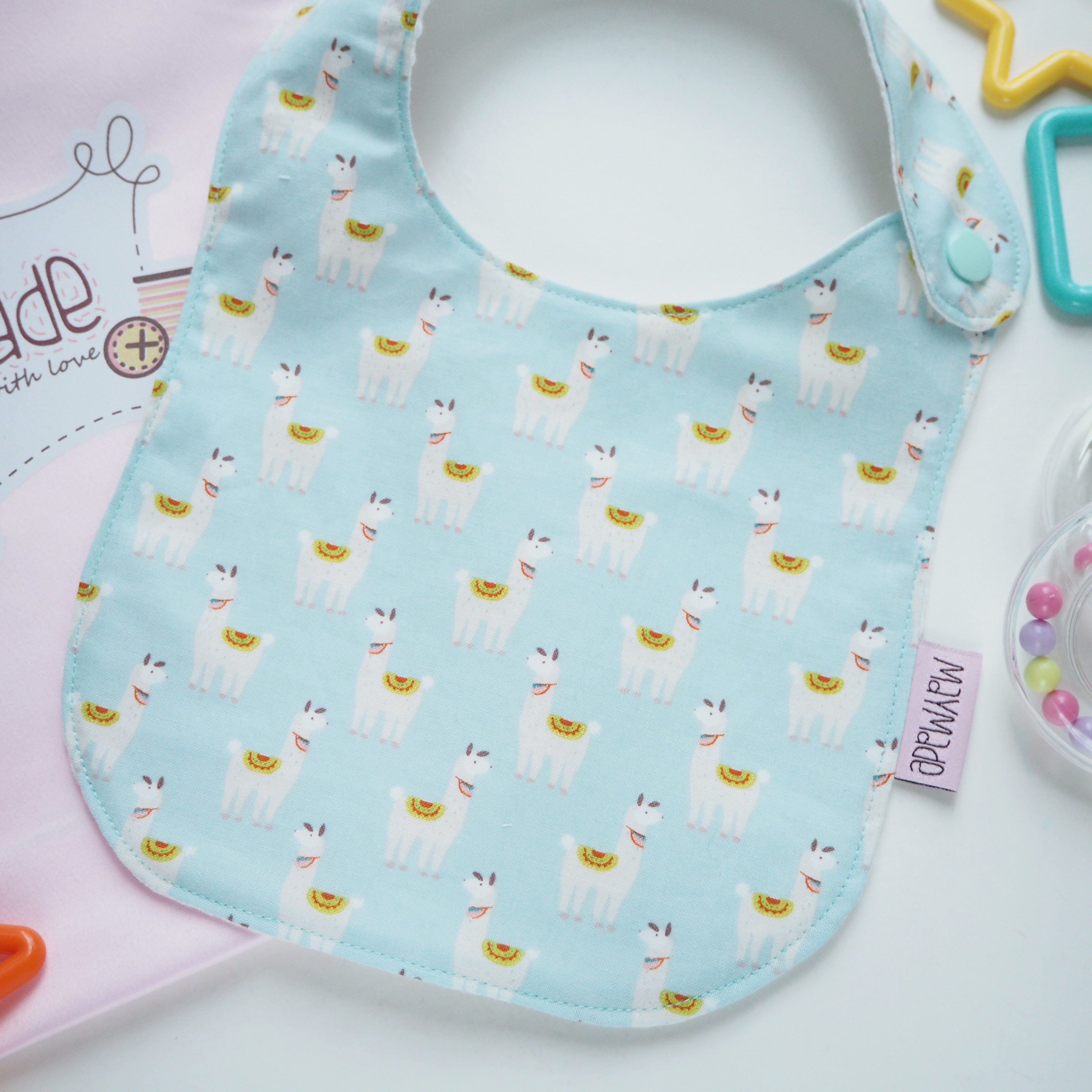 粉綠羊駝圖案口水肩