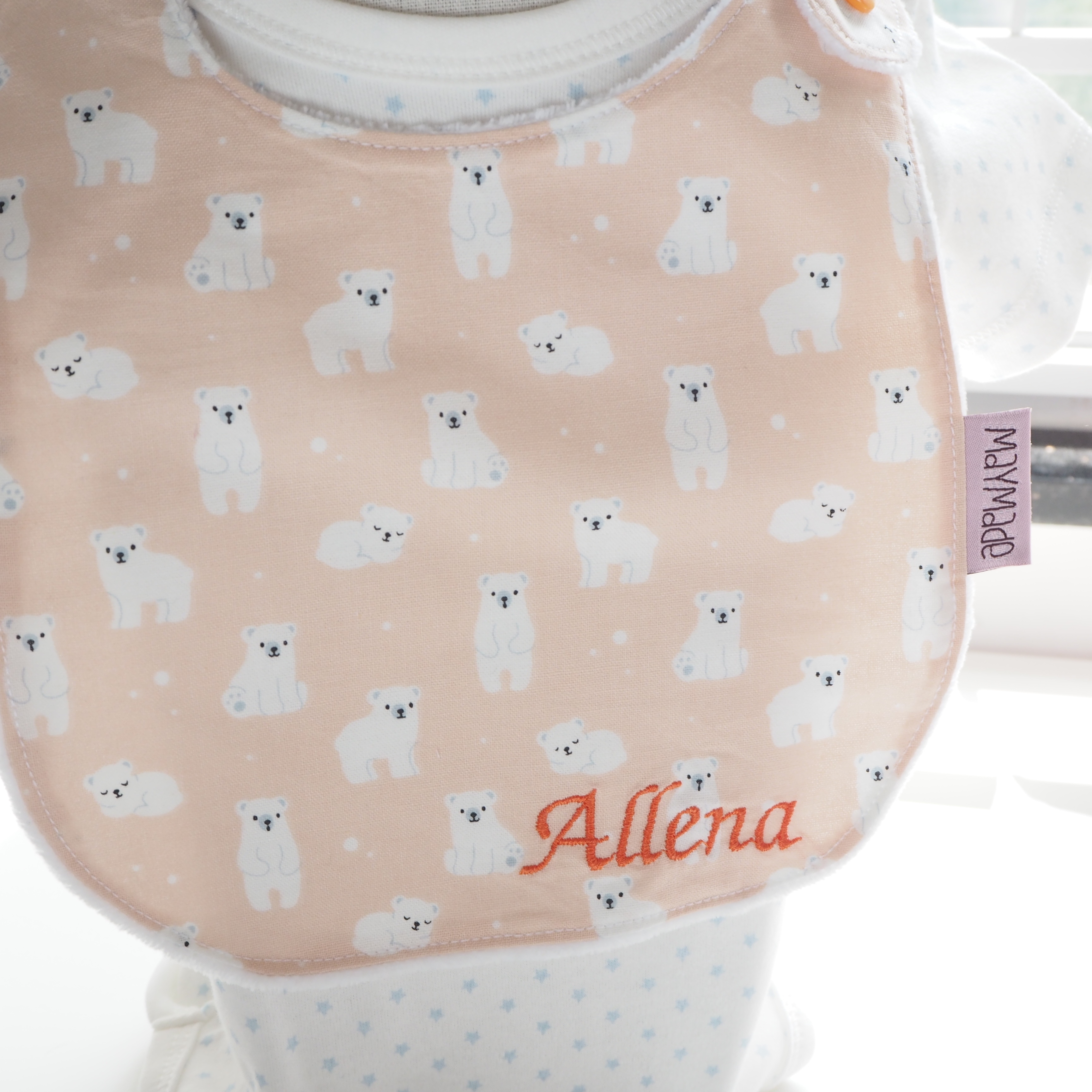 橙色小白熊圖案口水肩