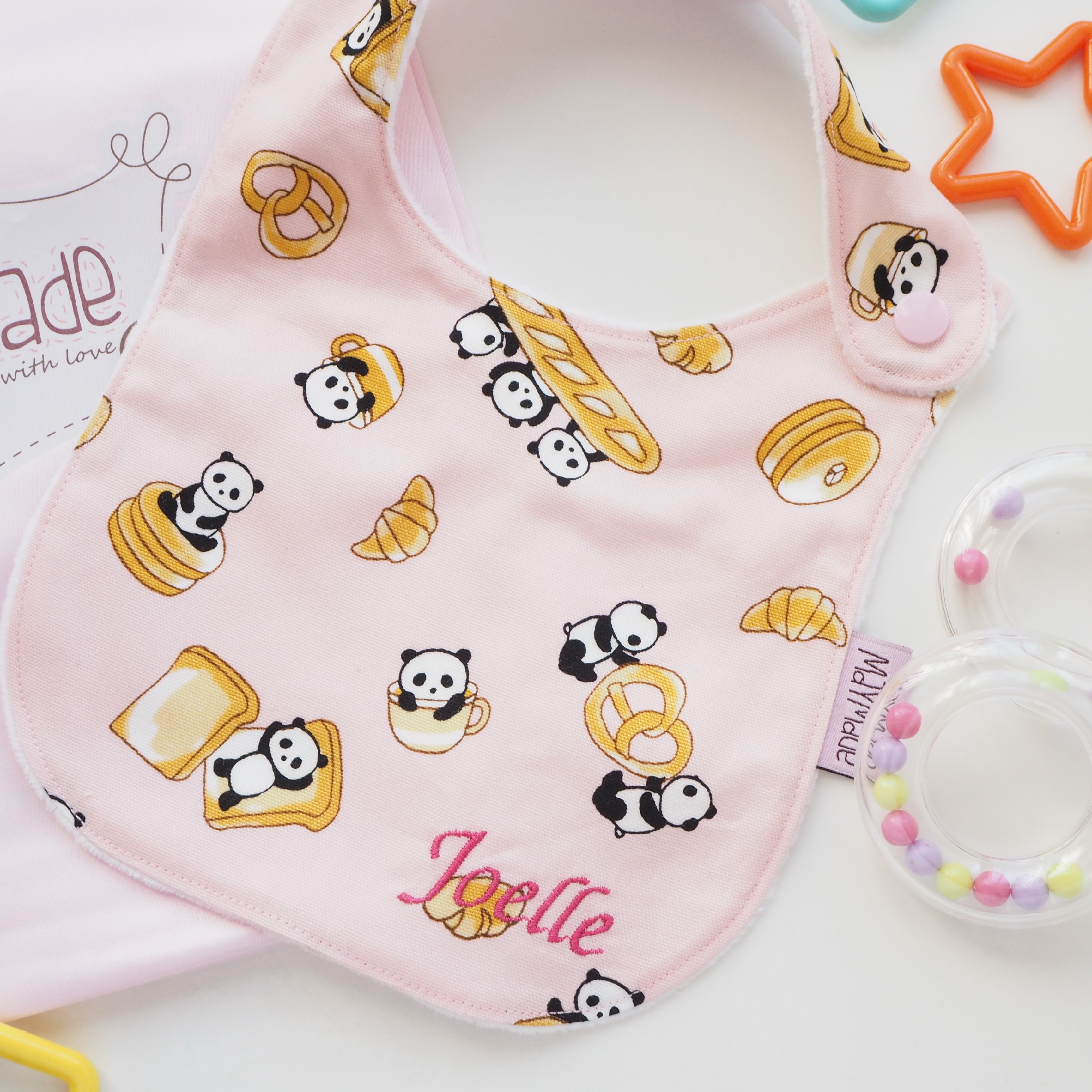 粉紅色麵包熊貓圖案口水肩