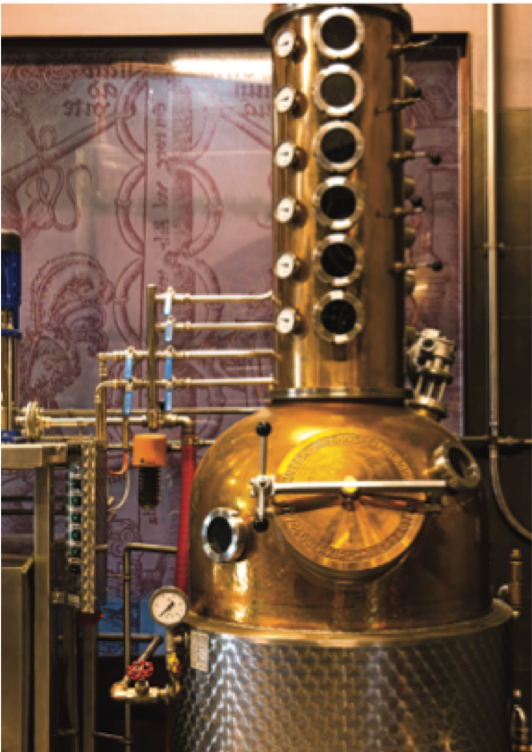 Carlos Dias among stills, whiskey thieves, barrels and glasses for spirits