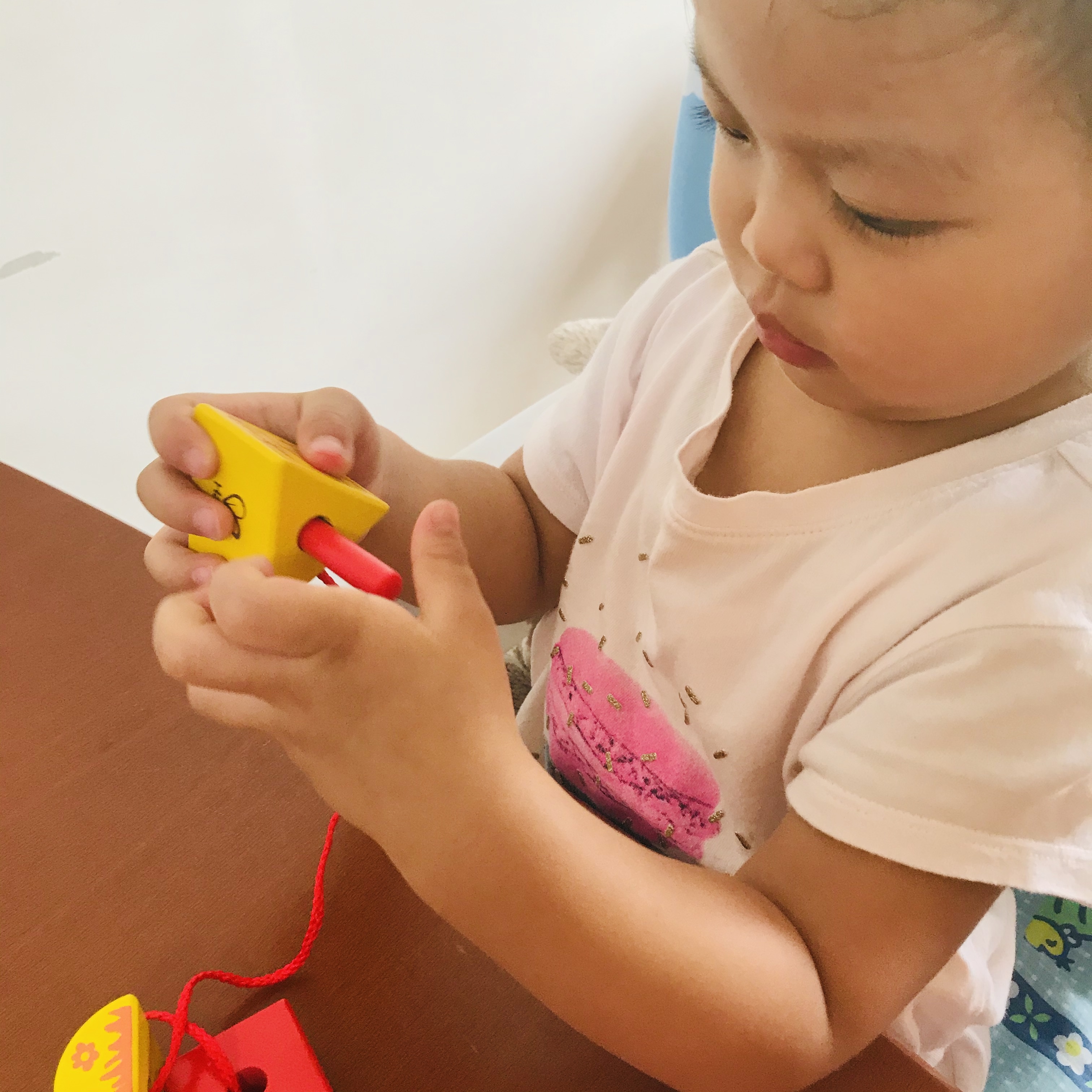 hape string along shapes