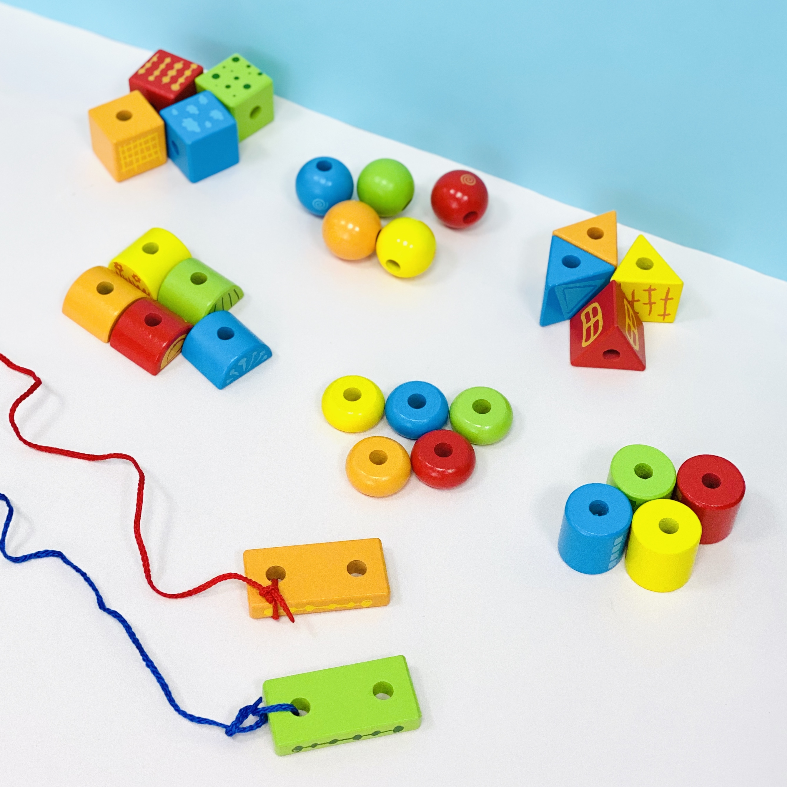 hape string along shapes