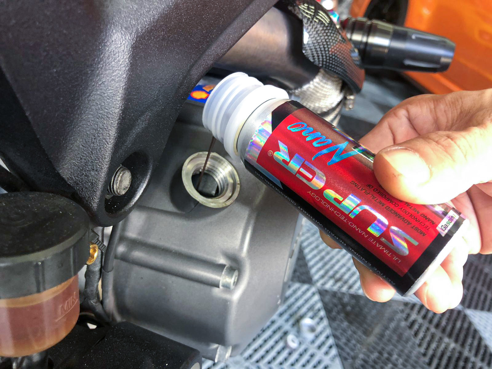 ducati monster 796 super nano engine restorer pouring engine oil bay