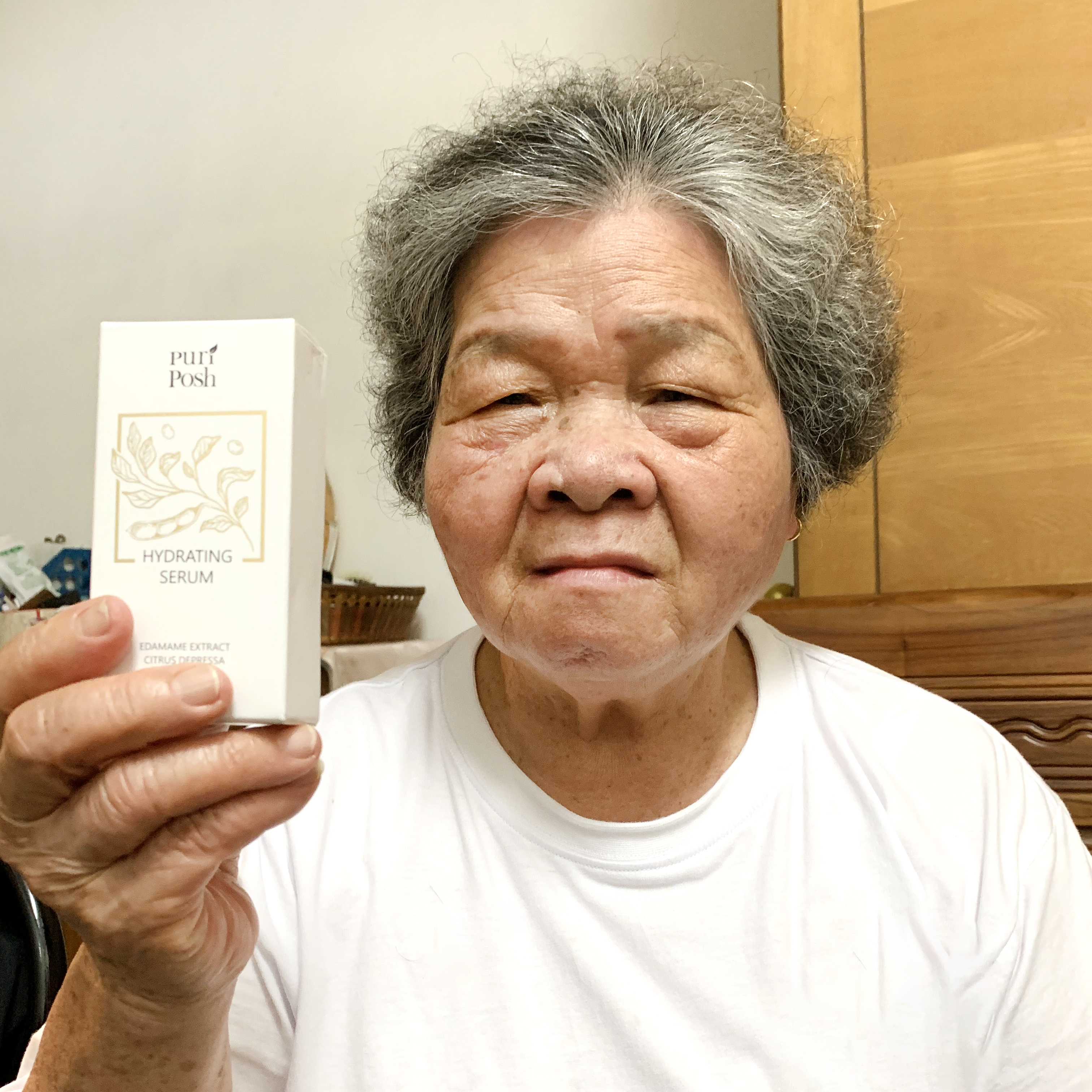 煥妍緊緻精華液