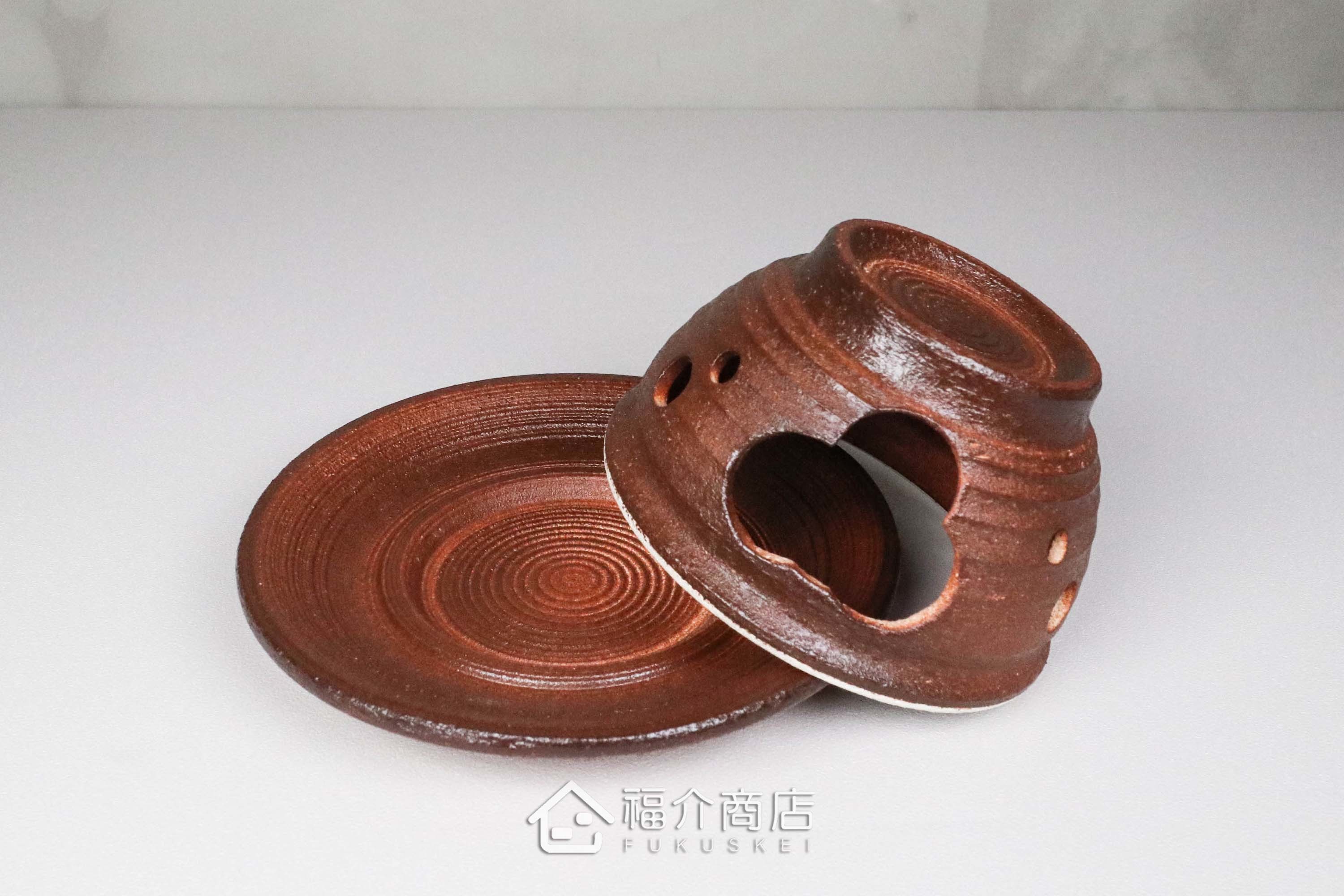 咖啡色的陶瓷茶香爐