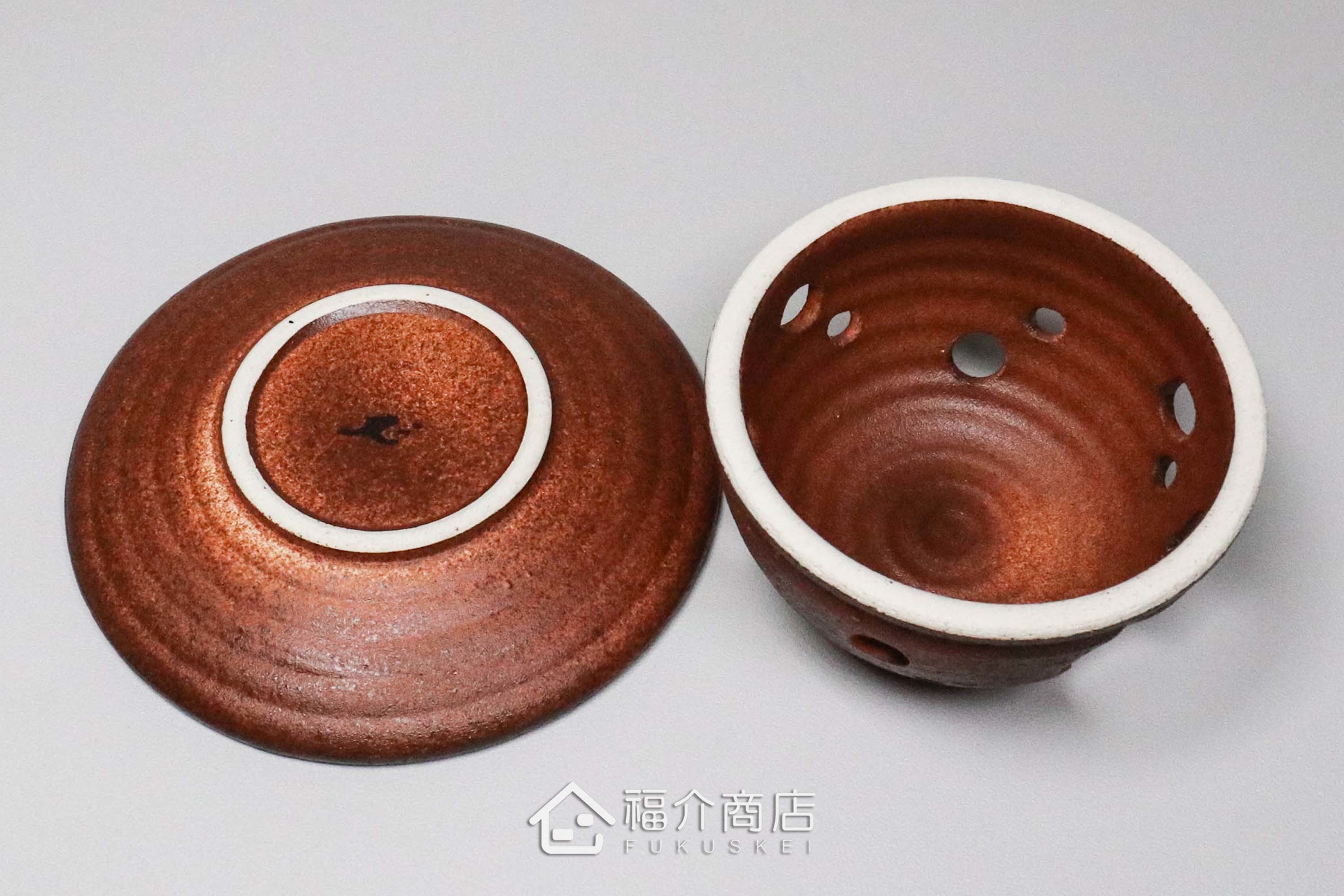 咖啡色的陶瓷茶香爐