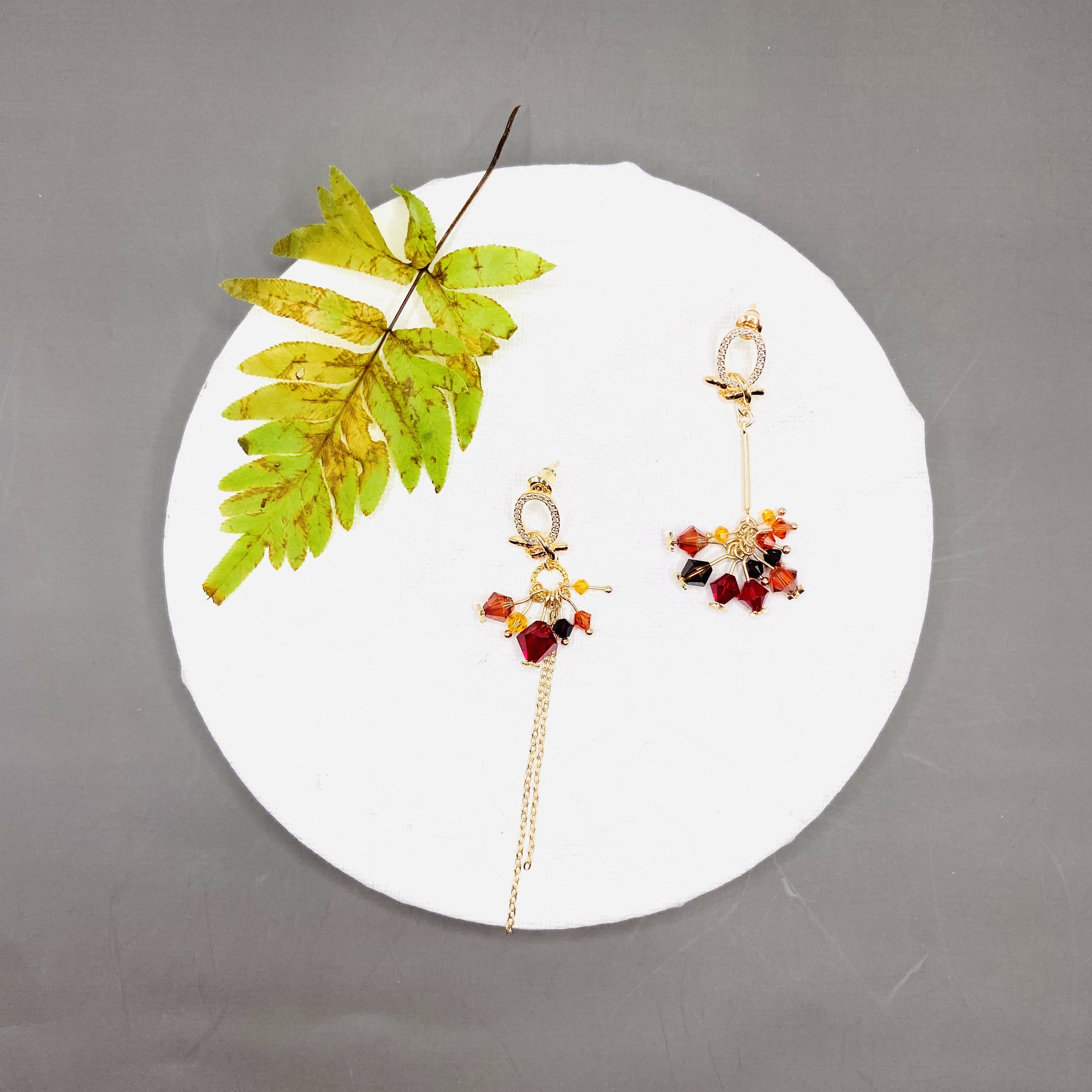 COLE COOL氣質型不對稱Swarovski水晶耳環耳夾