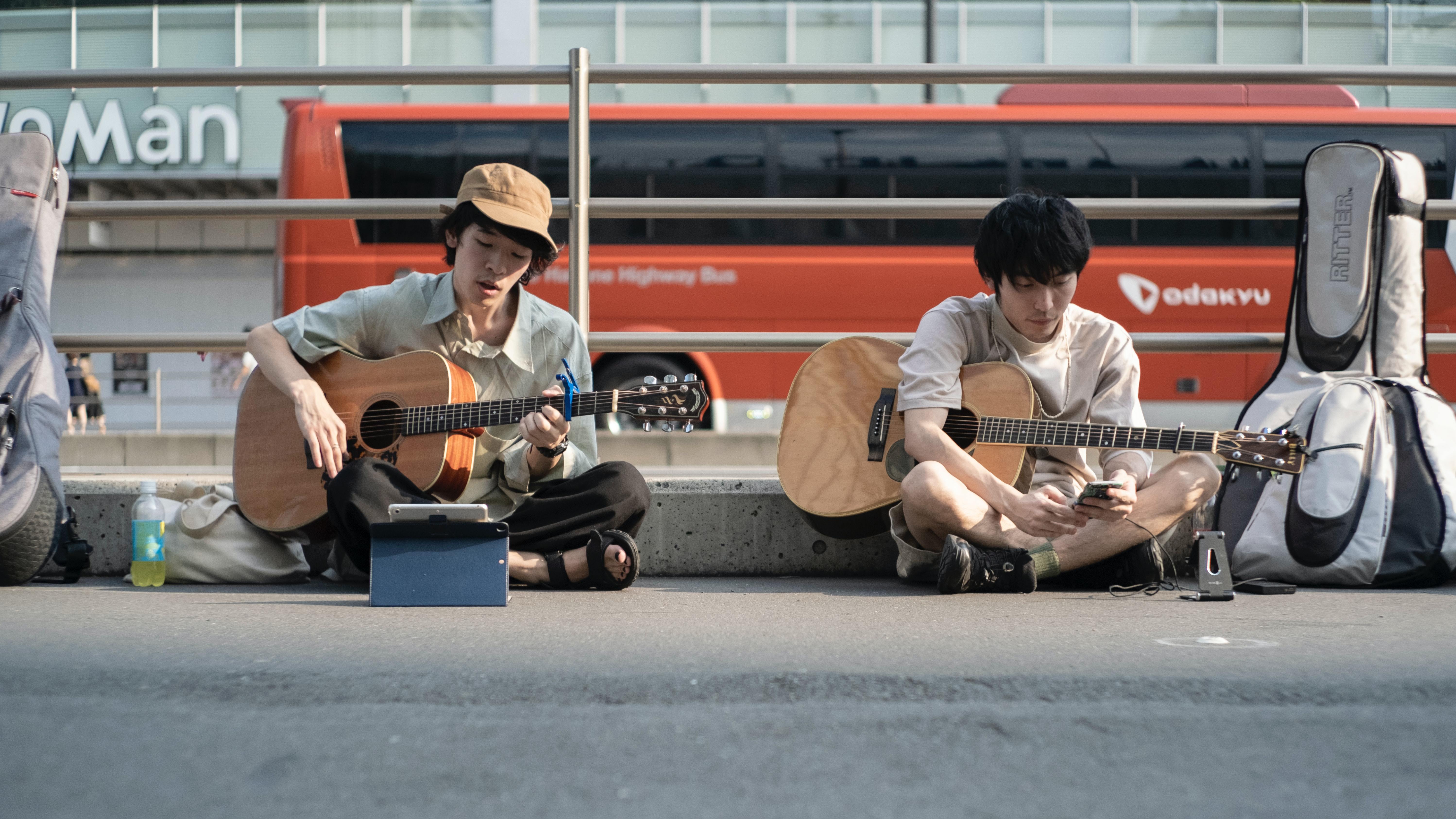 basking musicians with guitars