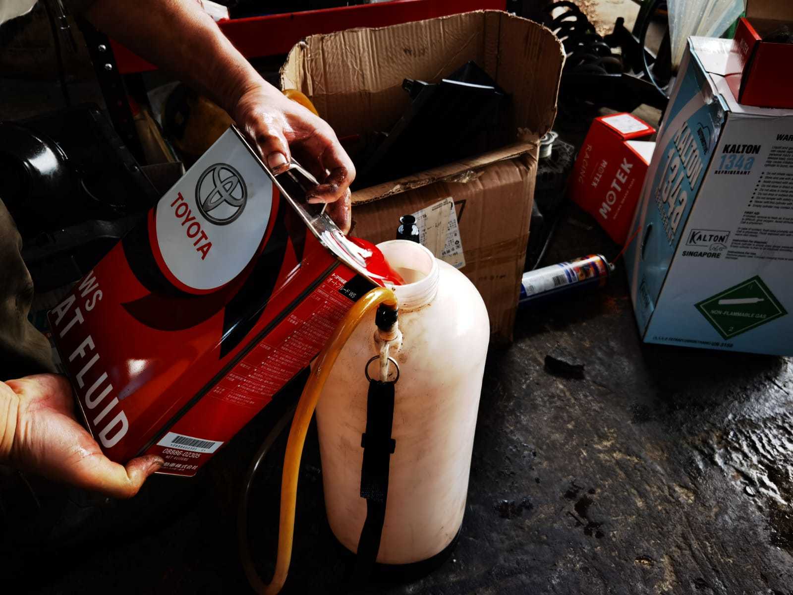 pour transmission restorer and transmission fluid mixture