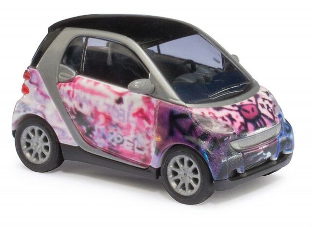 1/87 BUSCH Smart Fortwo 07 Puzzlesmart (Pink Skull) (46117)