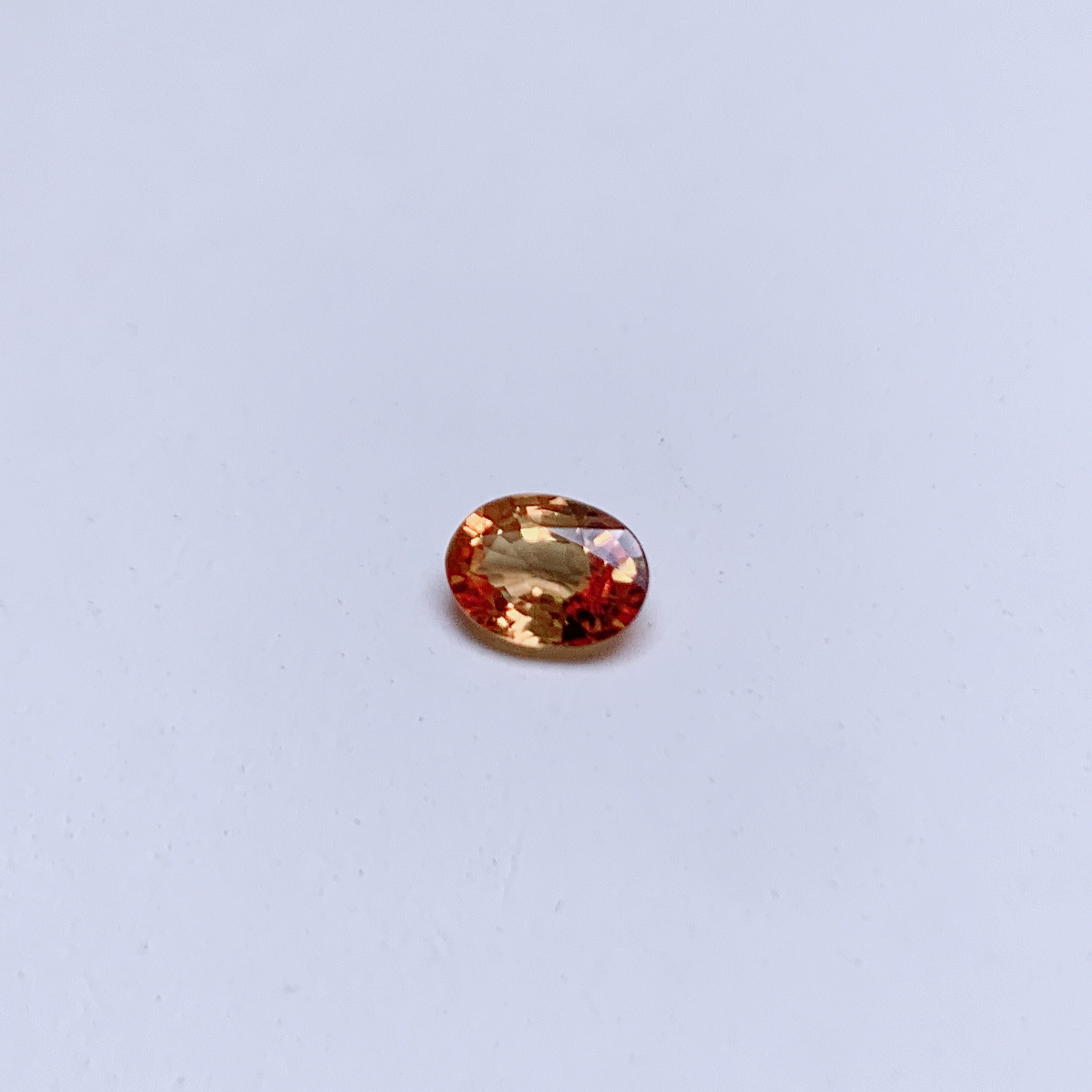 0.88ct 橢圓形橙色藍寶石