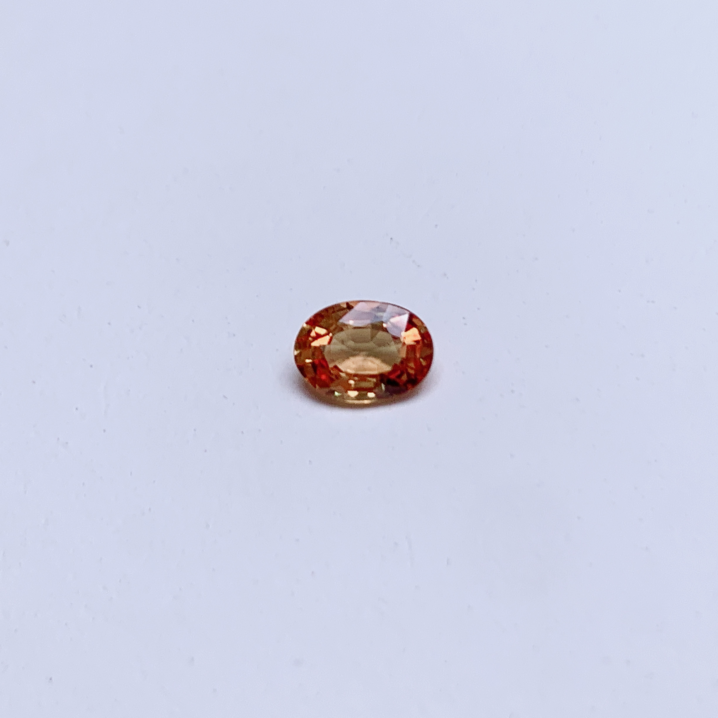 0.88ct 橢圓形橙色藍寶石