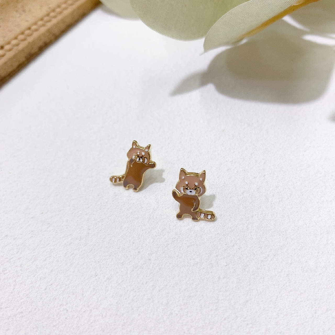 [日本制] 浣熊樹脂耳環