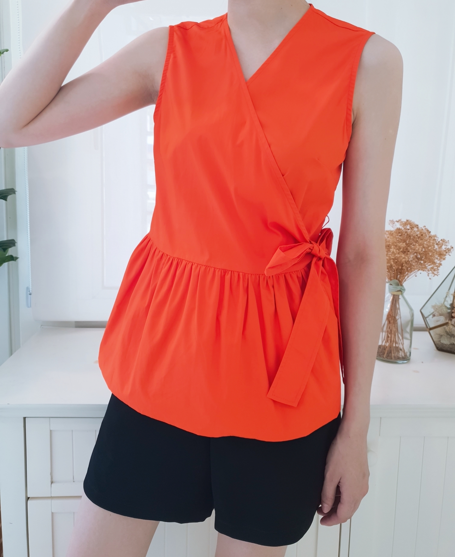 FRONT RIBBON WRAP PEPLUM BLOUSE