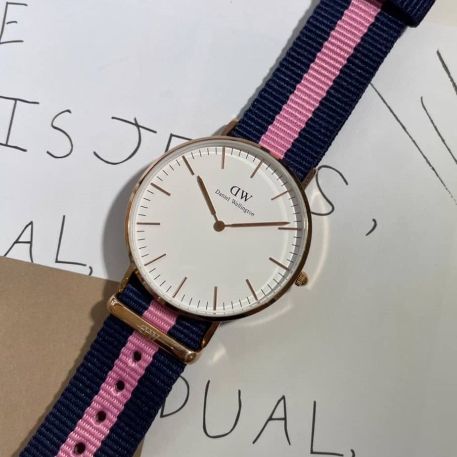 【DW Daniel Wellington】白面玫瑰金框藍粉藍帆布錶帶 DW00100033 36mm 現代鐘錶