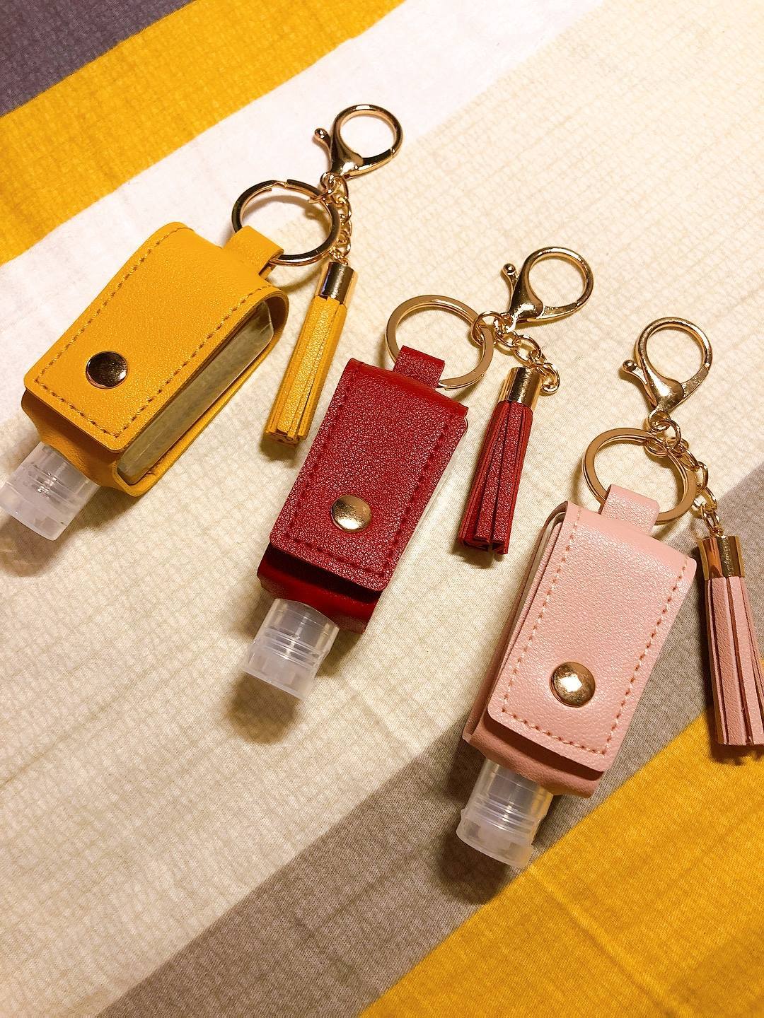 「吱吱裝」型格流蘇皮套鑰匙扣 抵買價 ( $29 買一送一 )