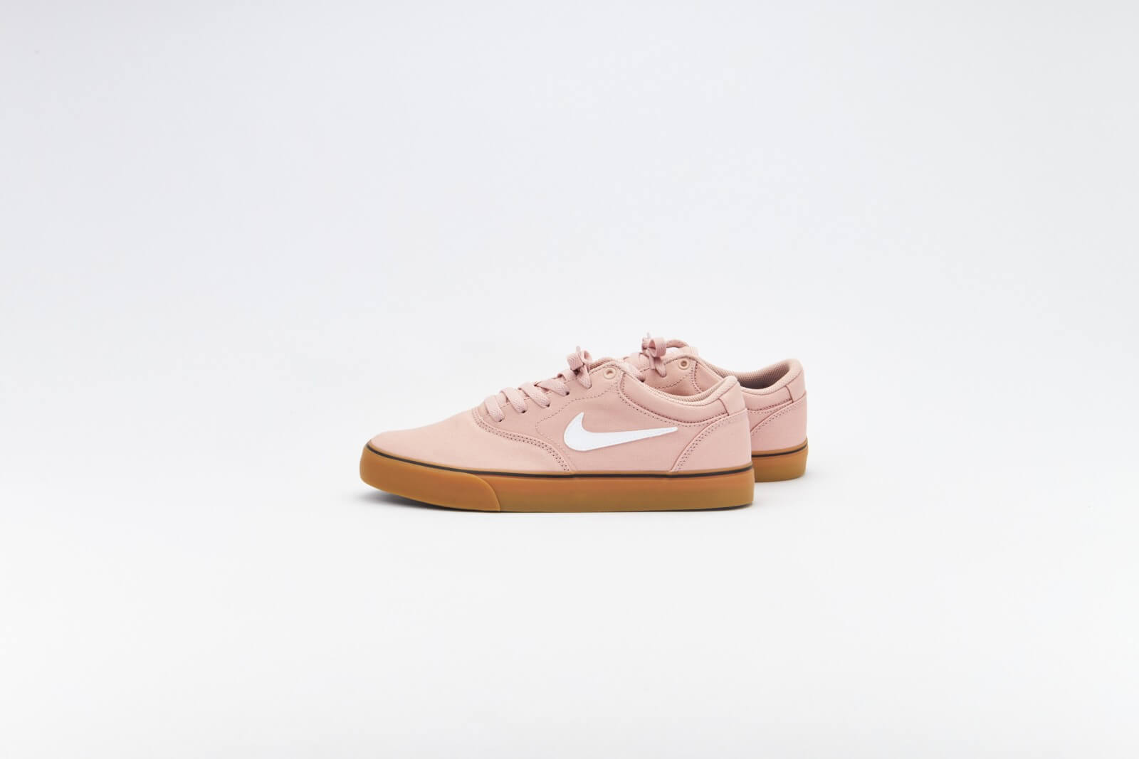 pink nike sbs