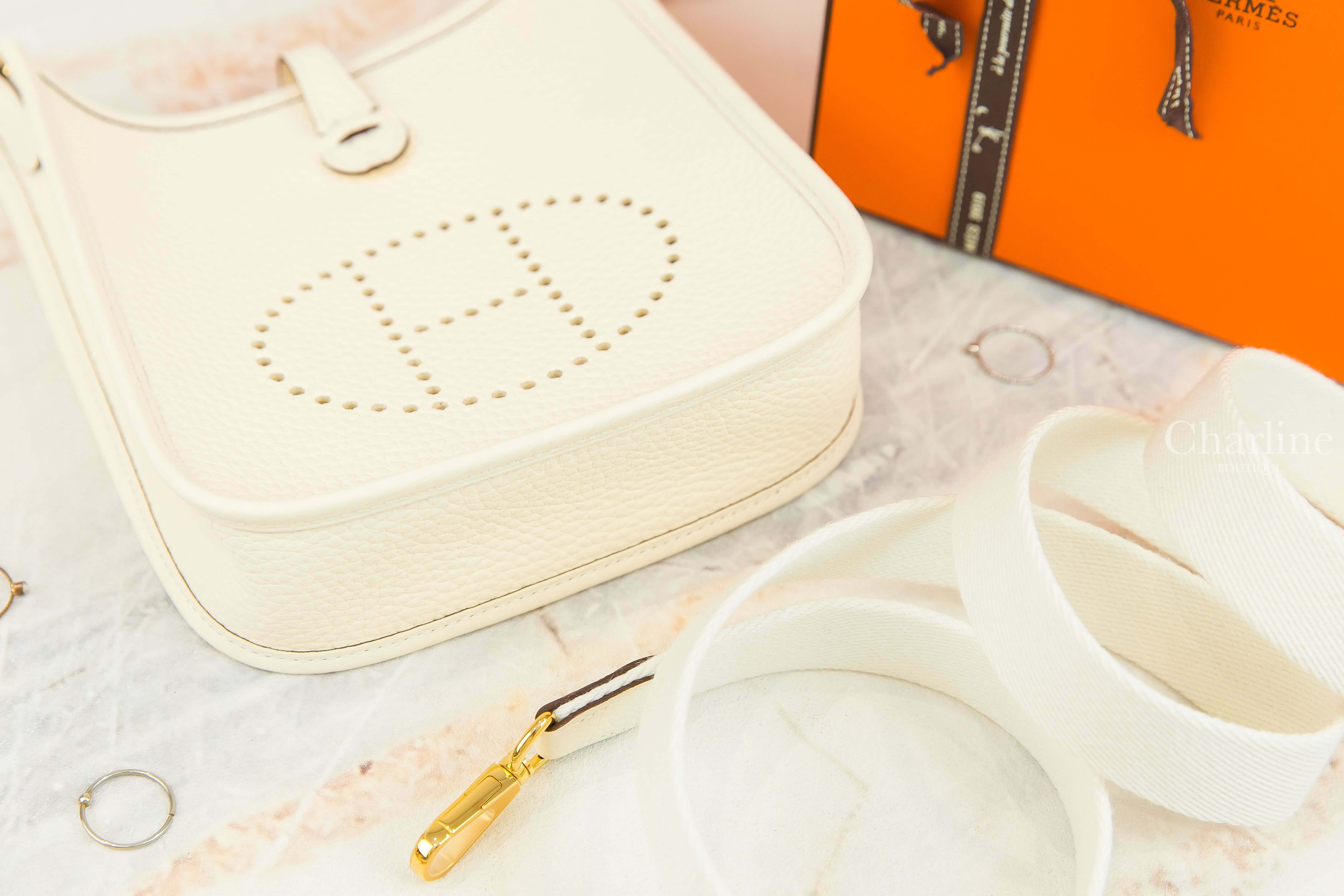 Hermès Evelyne TPM 16cm I2 Nata Taurillon Clemence Z刻奶油白金釦白色背帶簍空洞洞肩背包-Charline Boutique 精品代購