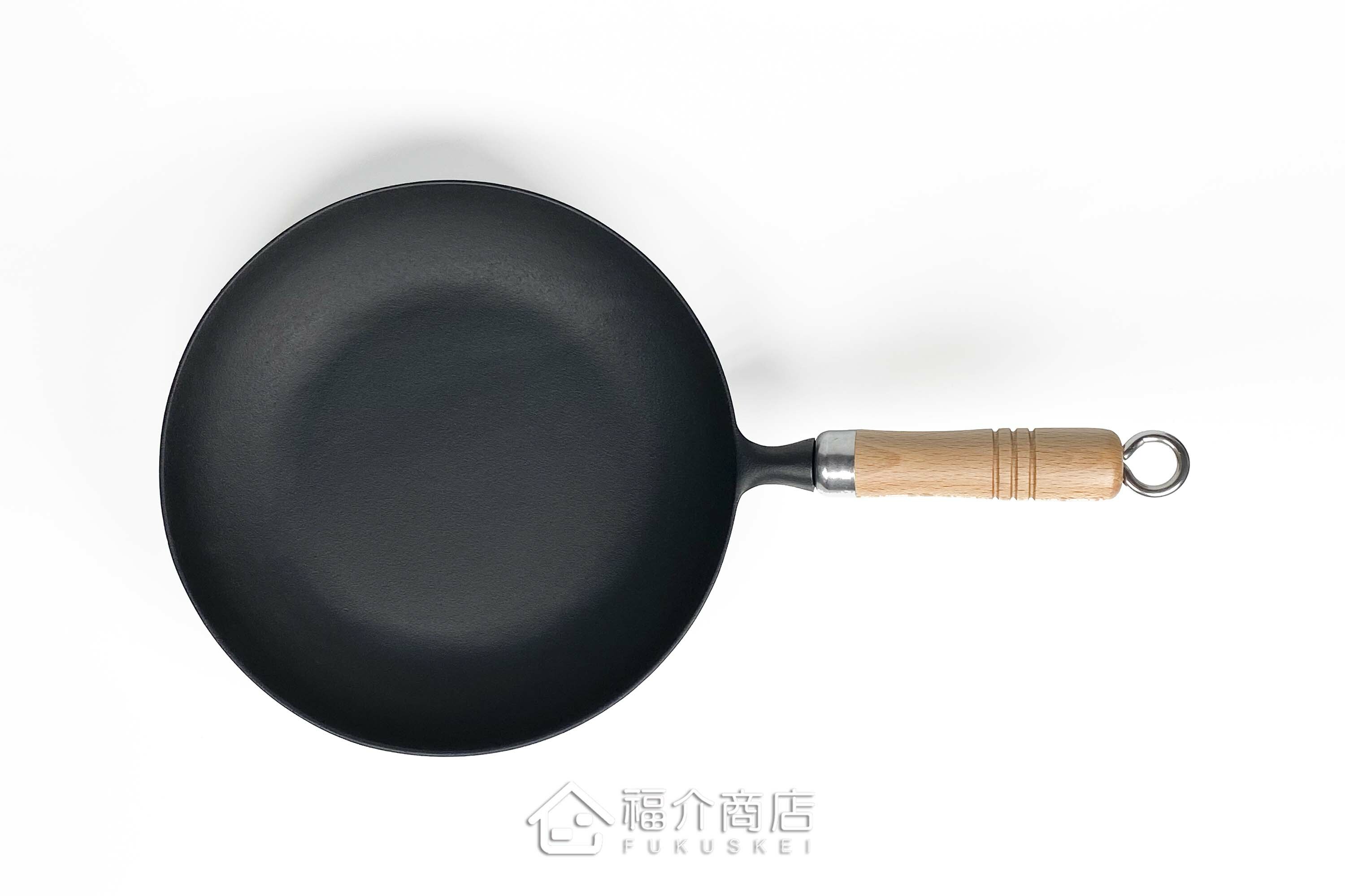 炒菜用的黑色鐵鍋