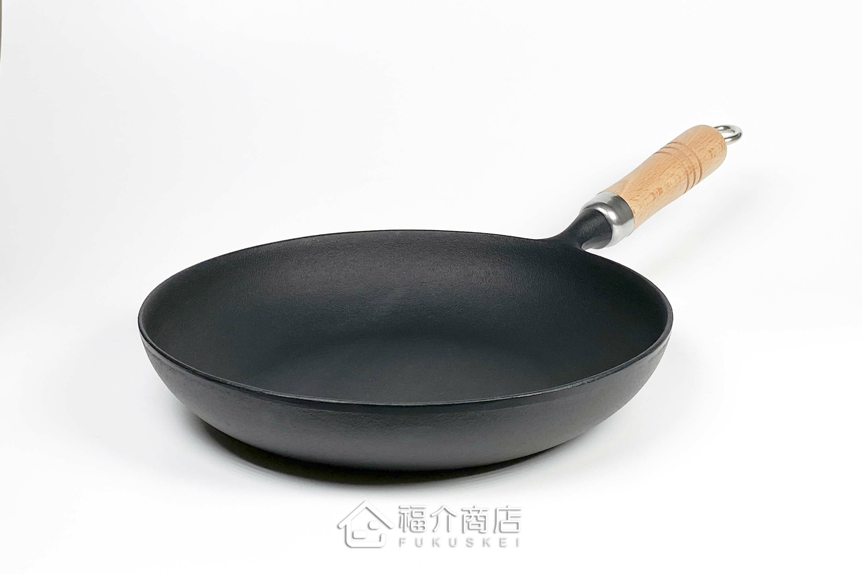 炒菜用的黑色鐵鍋