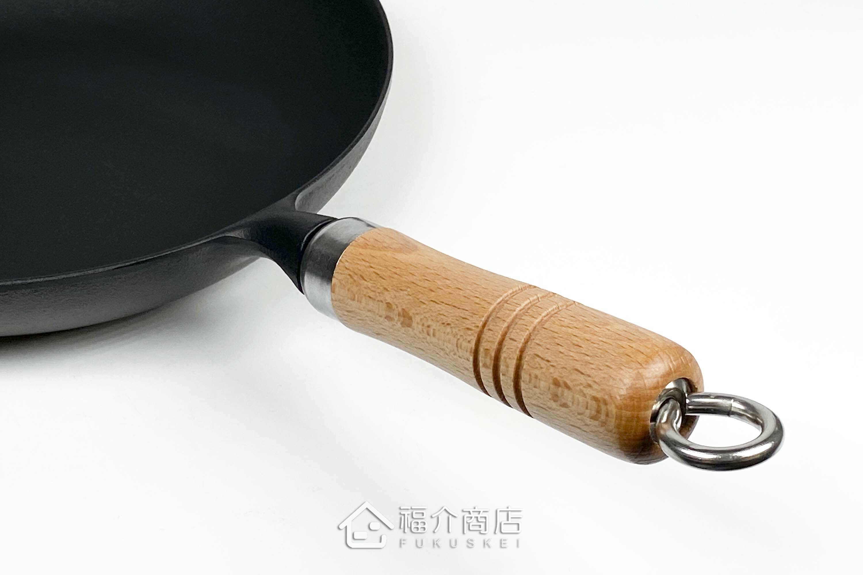 炒菜用的黑色鐵鍋