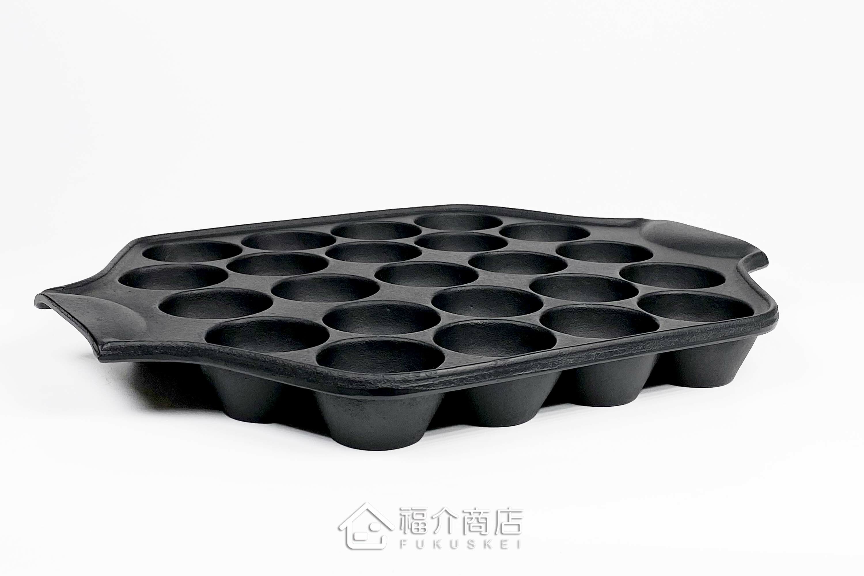 做章魚燒的黑色鐵盤