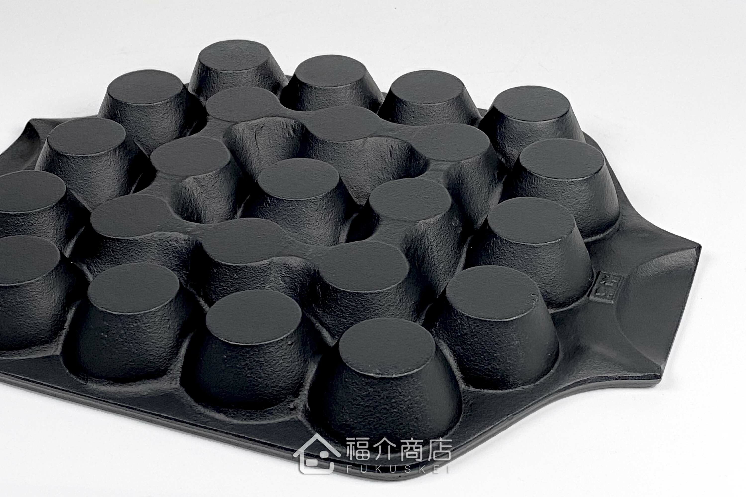 做章魚燒的黑色鐵盤