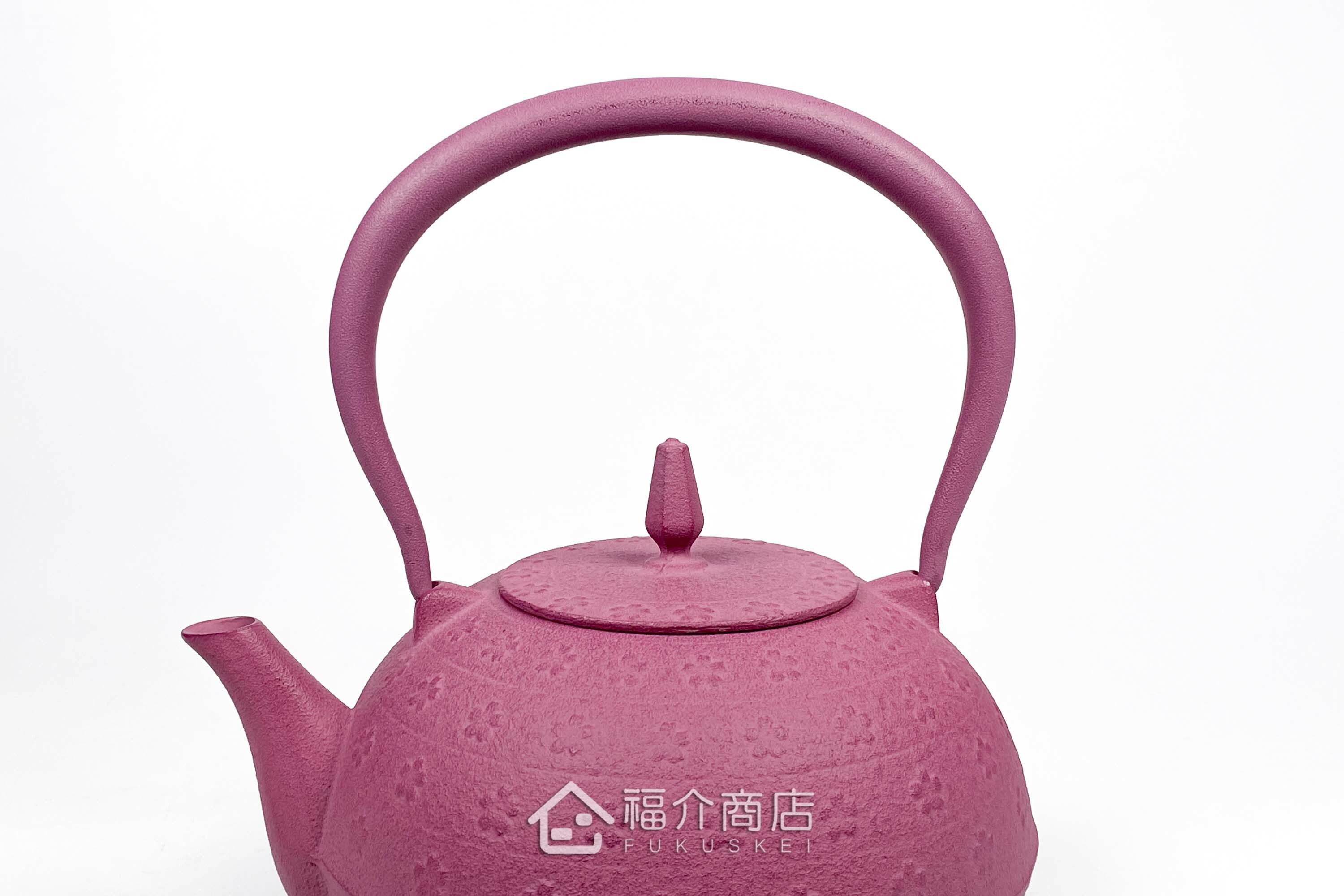 粉紅色的泡茶煮水鐵壺